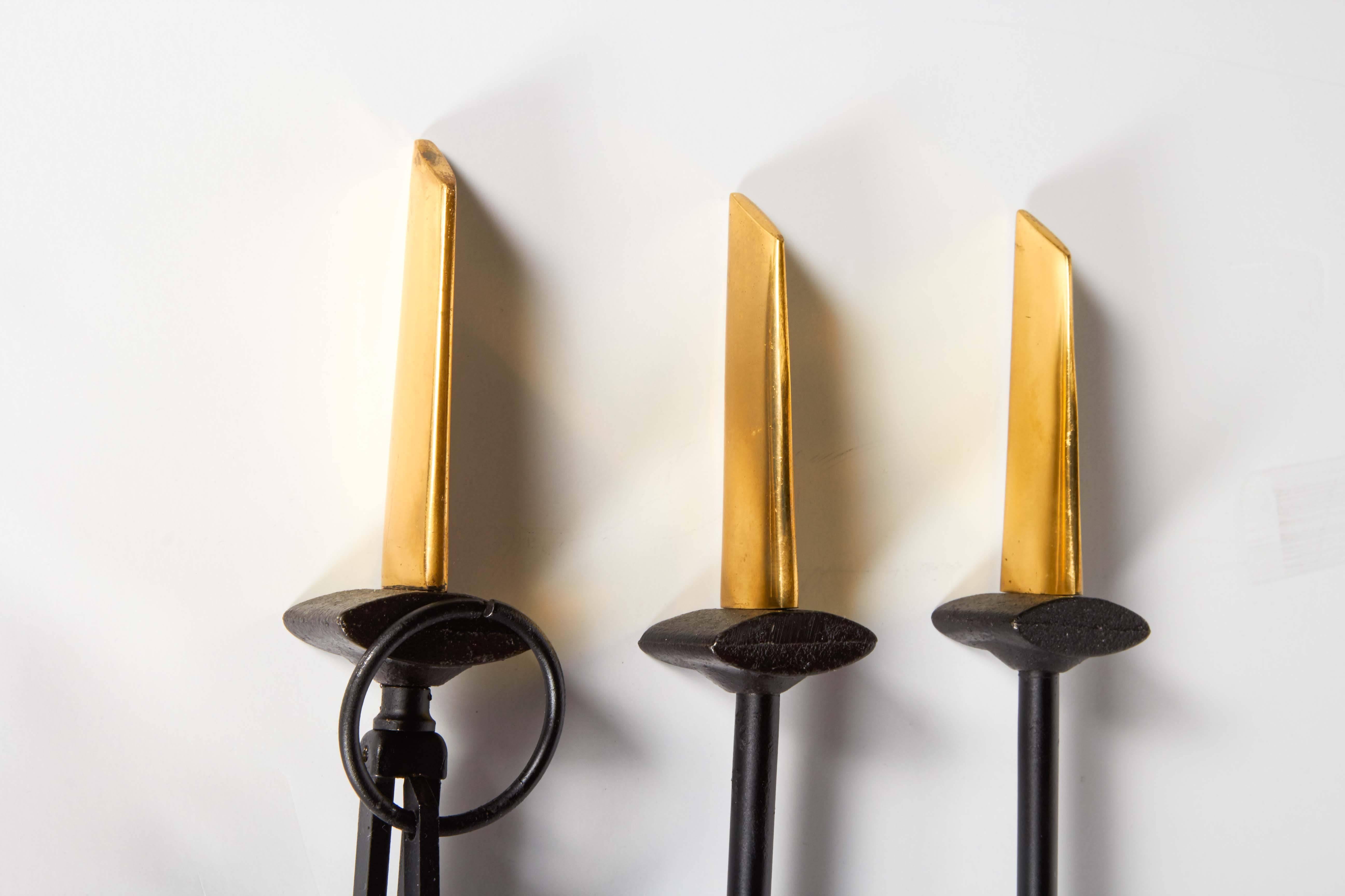 American Donald Deskey Wall Mounted Fireplace Tools in Brass and Black Iron, c. 1950's