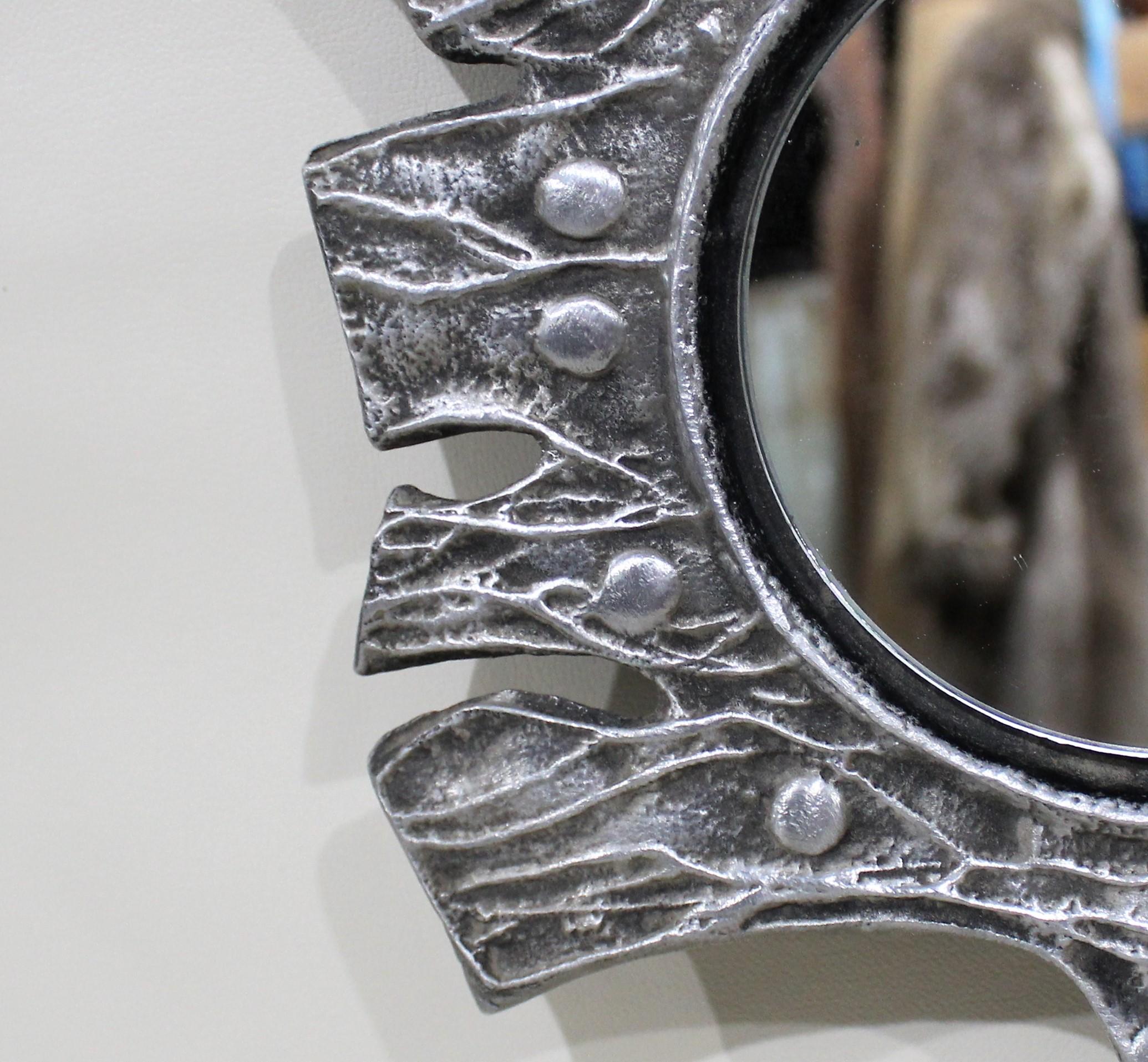 Cast aluminum Mid-Century Modern Brutalist mirror by Donald Drumm.