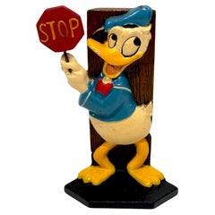 stop/porte d'entrée Donald Duck en fonte de Walt Disney Productions, 1971