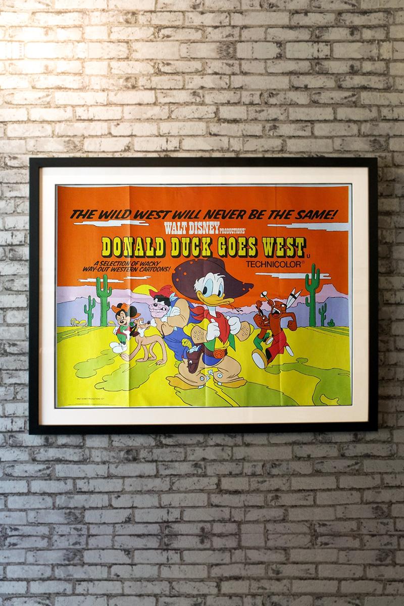 Donald Duck Goes West is a 1975 Disney compilation film featuring western-themed Disney cartoons. It was theatrically released overseas, while the U.S. never had a theatrical release.

Linen-backing:
£150

Framing options:
Glass and single