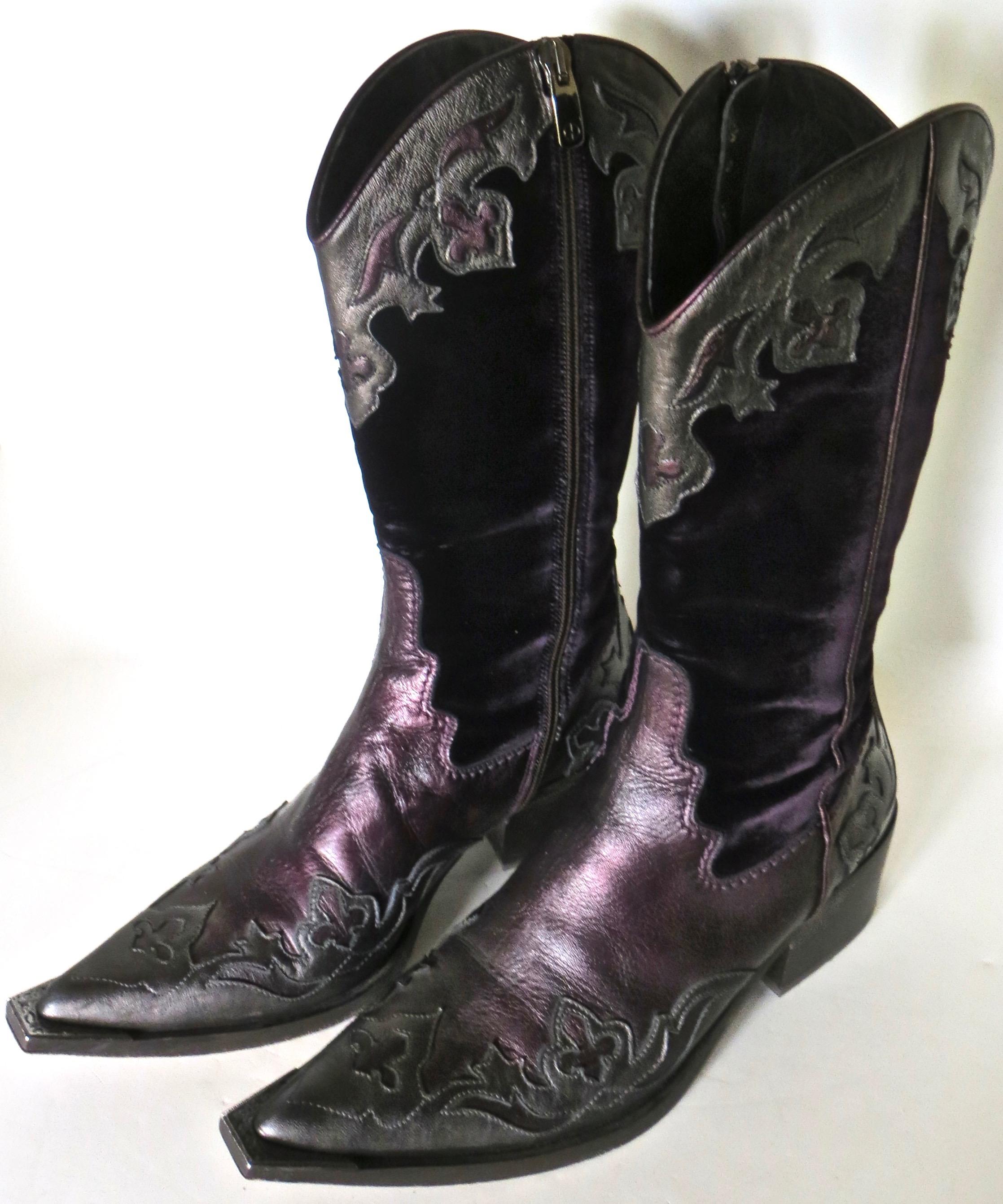 Circa 2000 beautiful and well made lady's western boots designed and manufactured by Donald J. Pliner; famous Italian luxury footwear designer.
Tool and dyed purple leather design with velvet side panels and full length zipper for 