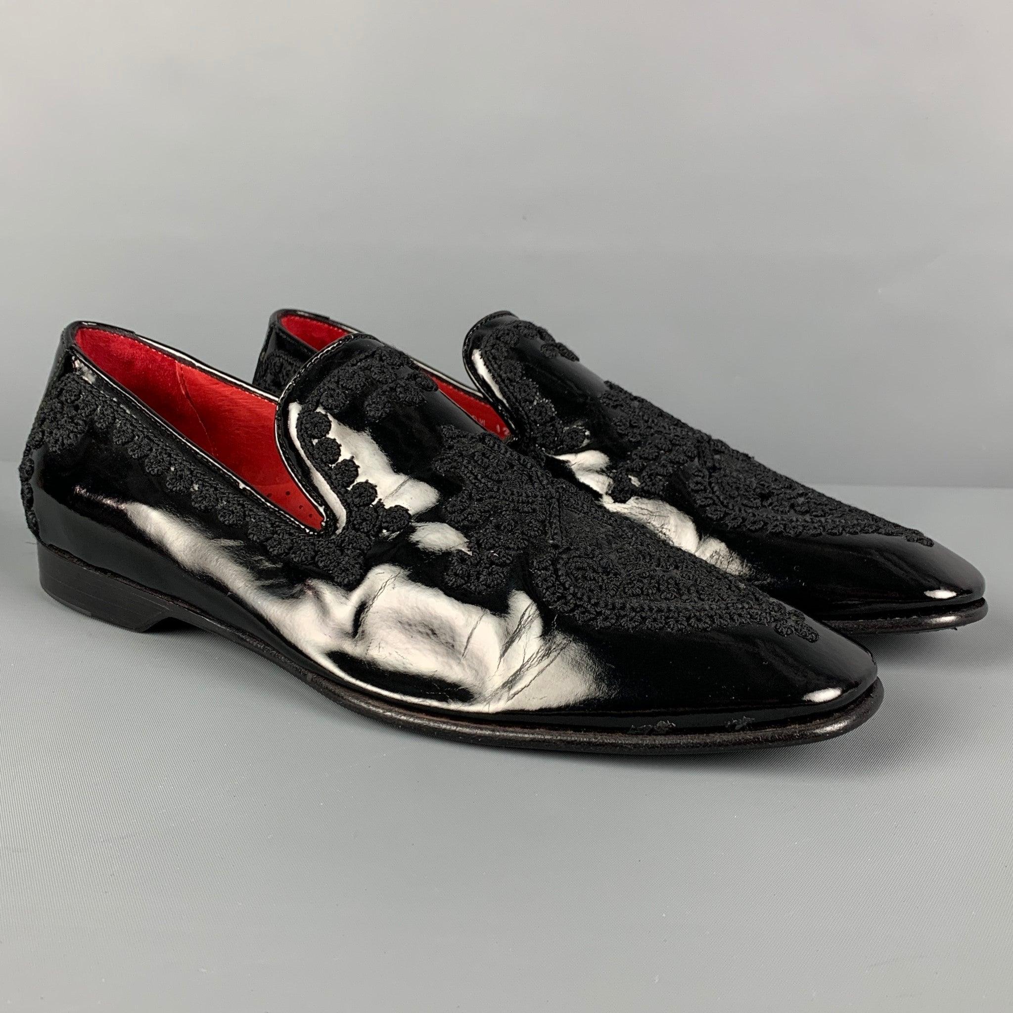DONALD J PLINER SIGNATURE loafers comes in a black patent leather featuring applique details, square toe, and a slip on style. Made in Italy.
Very Good
Pre-Owned Condition. Light wear.  

Marked:   9 MOutsole: 11.75 inches  x 3.75 inches 
  
  
