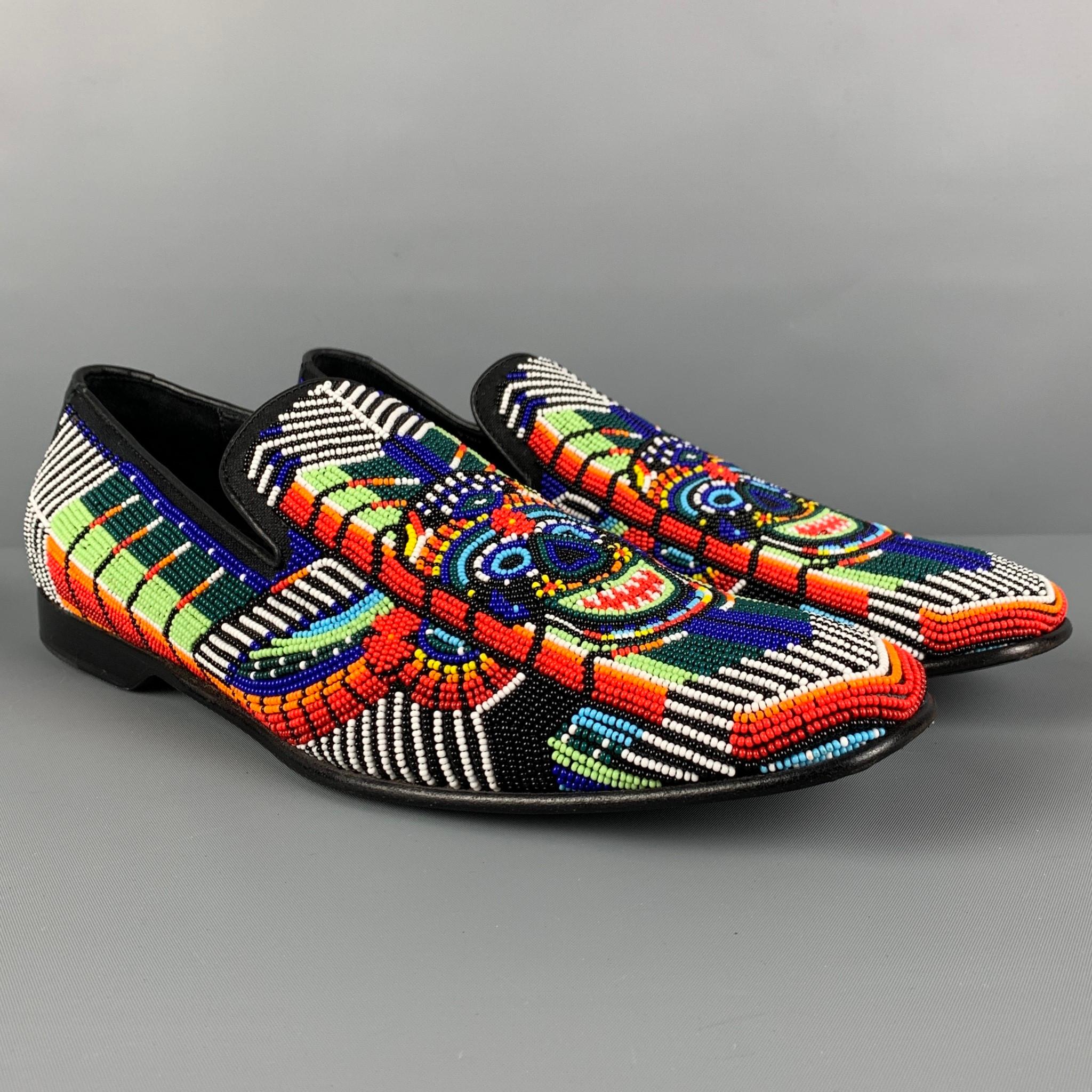 DONALD J PLINER SIGNATURE loafers comes in a multi-color beaded leather featuring a slip on style and a square toe. Made in Italy. 

Excellent Pre-Owned Condition.
Marked: 9.5 M

Outsole: 12 in. x 4 in. 

