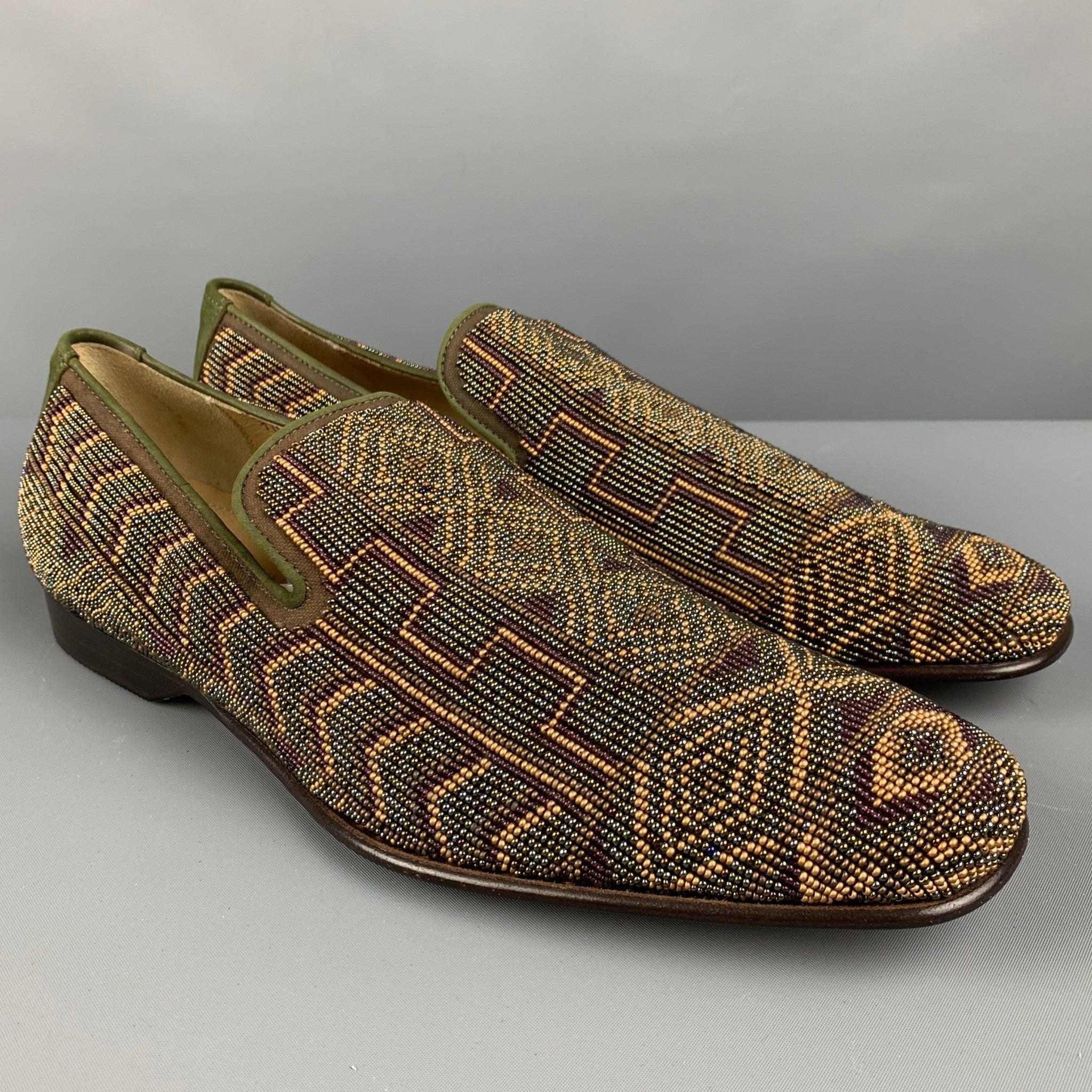 DONALD J PLINER loafers in an olive green leather featuring an all over tribal beaded pattern, and slip on style. Made in Italy. Excellent Pre-Owned Condition. 

Marked:   10Outsole: 12 inches  x 4 inches 
  
  
 
Reference: 126930
Category: