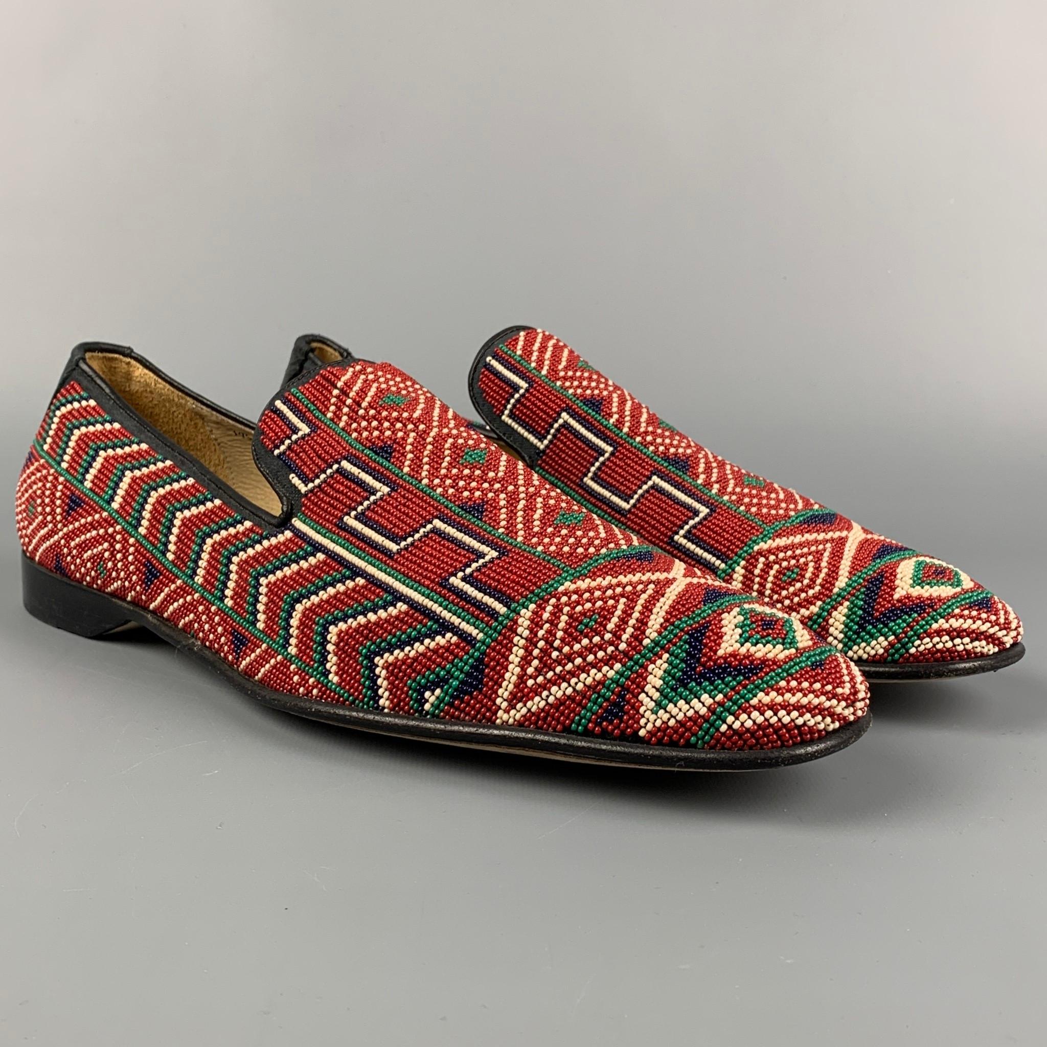 DONALD J PLINER loafers comes in a red beaded leather featuring a square toe and s slip on style. Made in Italy. 

Very Good Pre-Owned Condition.
Marked: 10.5 M PONTSP

Outsole: 12.5 in. x 4 in. 

 