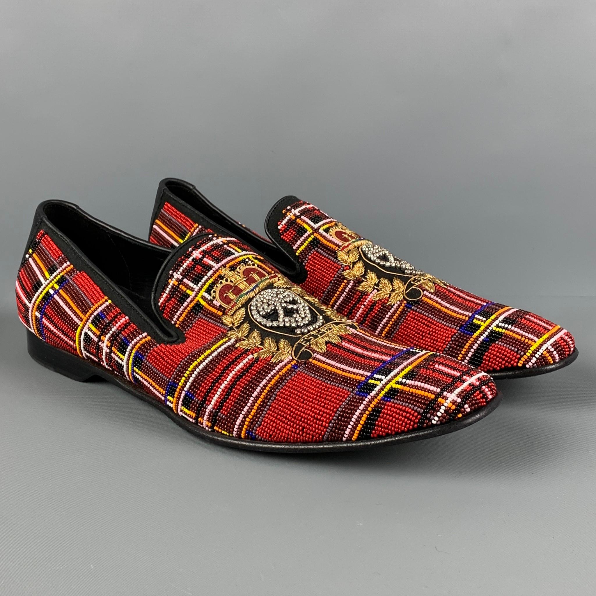 DONALD J PLINER loafers comes in a multi-color beaded material featuring a 'Royal Skull Crest'  design, slip on, and a square toe. Made in Italy. 

Very Good Pre-Owned Condition.
Marked: 12 M

Outsole: 12.75 in. x 4.25 in. 