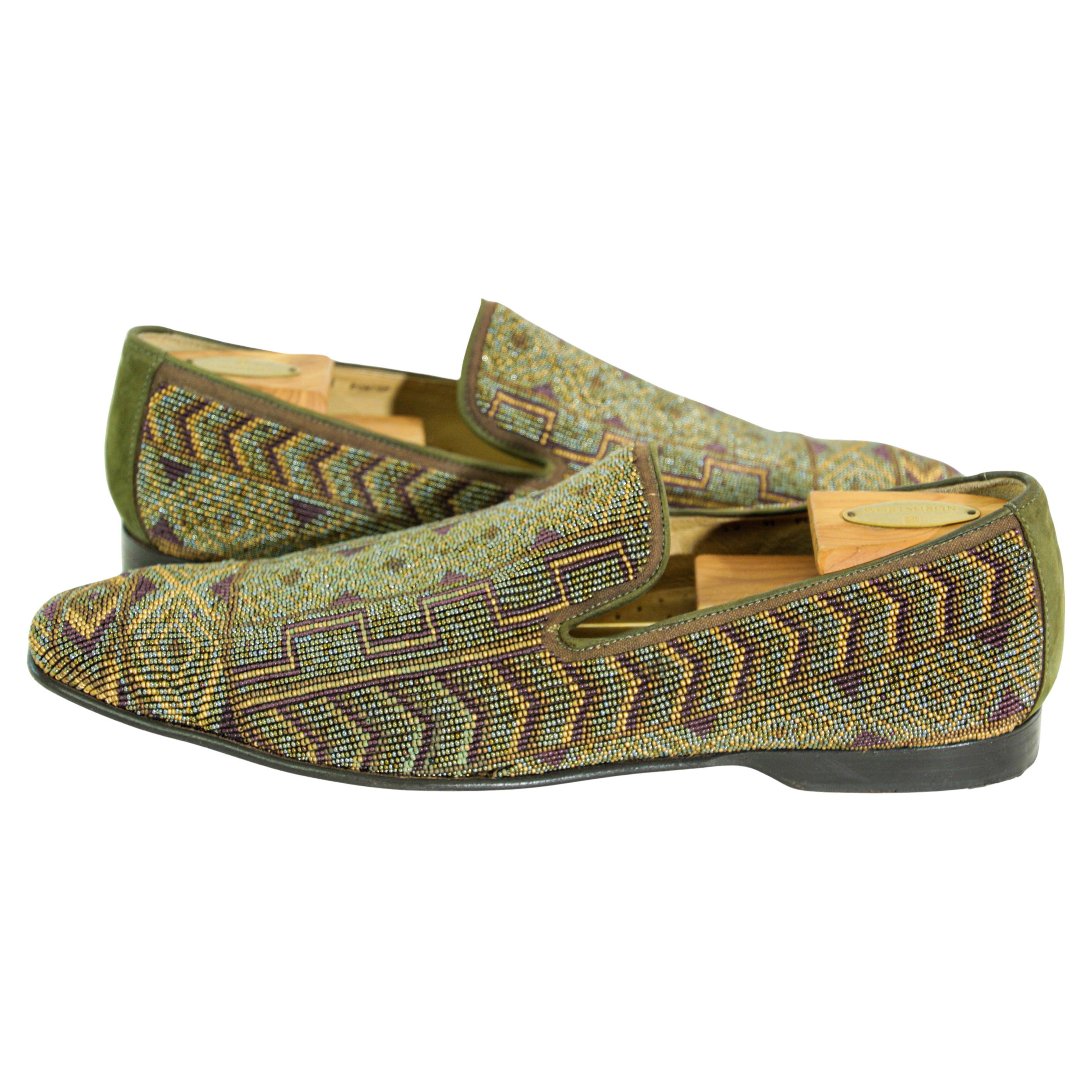 DONALD J PLINER Size US 13 Green Purple Beaded Leather Slip On Loafers.
DONALD J PLINER loafers in an olive green leather featuring an all over tribal beaded pattern, and slip on style. 
Late 90s DONALD J PLINER fully beaded loafers.
Gorgeous hand