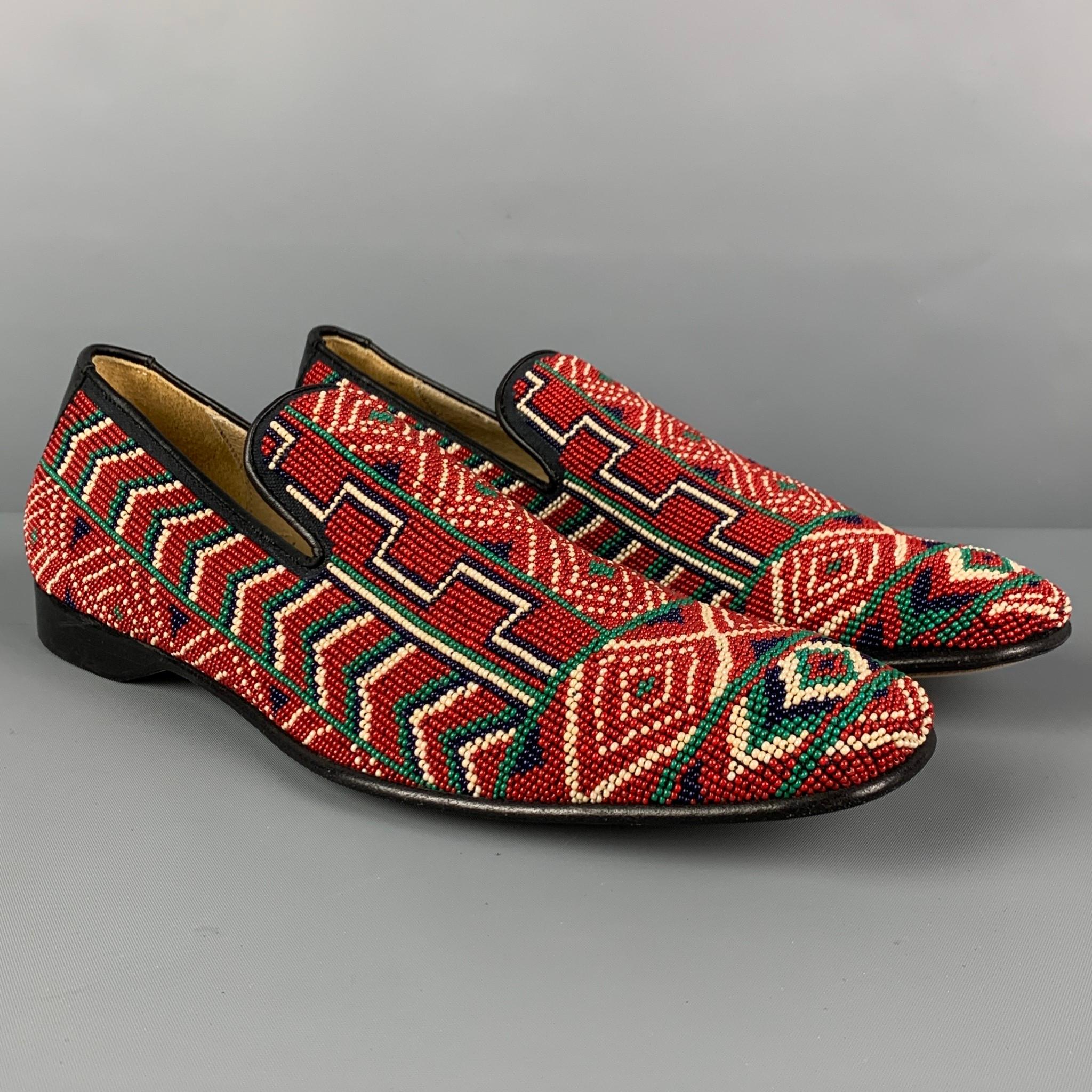 DONALD J PLINER loafers comes in a multi-color beaded leather featuring a slip on style and a square toe. Made in Italy. 

Very Good Pre-Owned Condition.
Marked: 9 M

Outsole: 11.75 in. x 4 in. 
