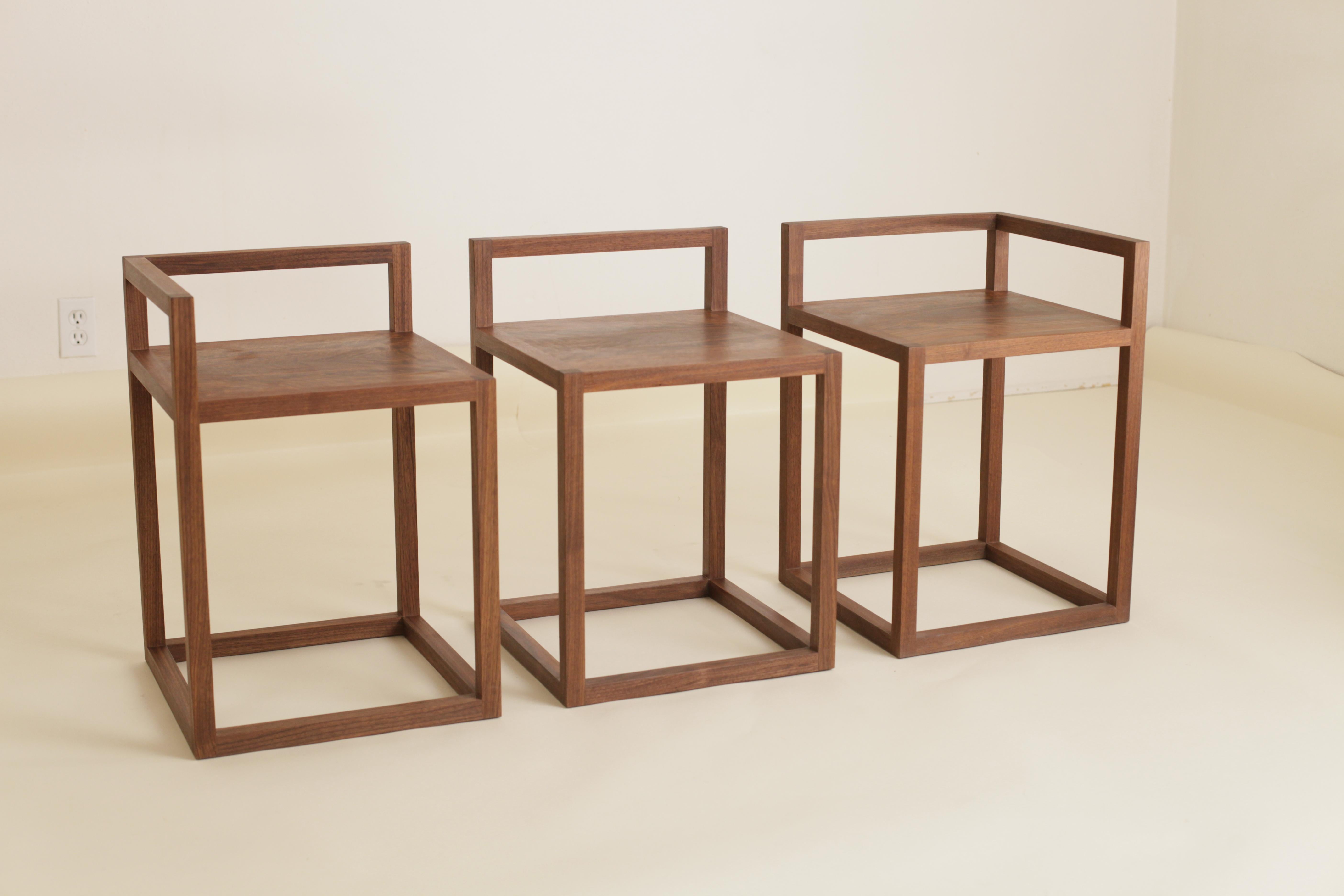 This Donald Judd inspired bench trio in walnut was originally made for my own one bedroom home. It elegantly solved the problem of occasionally needing additional dining seating and also wanting an entry bench. Inspired by a trio made by Donald