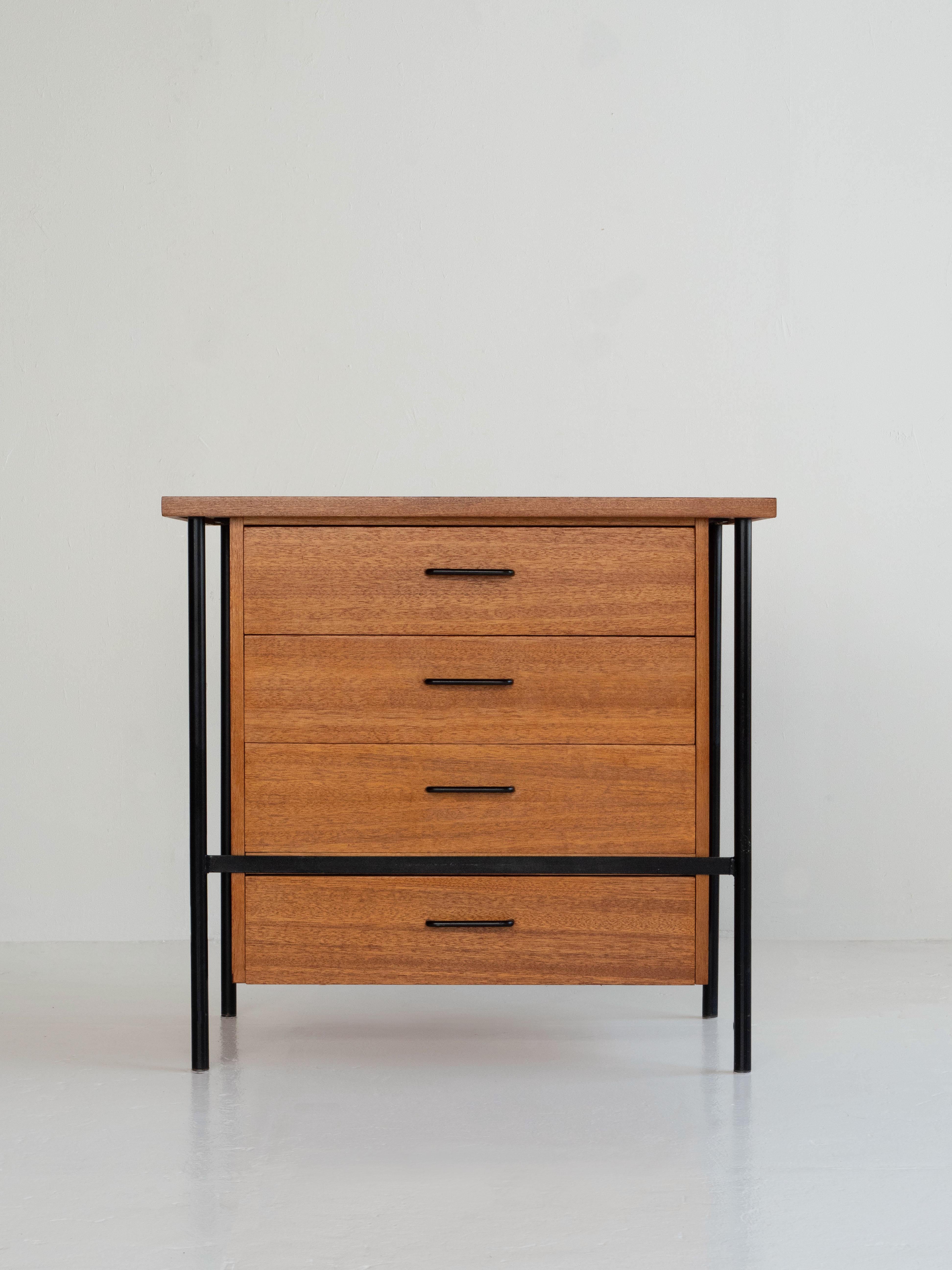 Mahogany four drawer dresser by designer Donald Knorr for Vista of California, circa 1950s. Very striking mahogany wood grain with a matte black tubular steel frame. 

This dresser is in very good original midcentury condition, only showing light