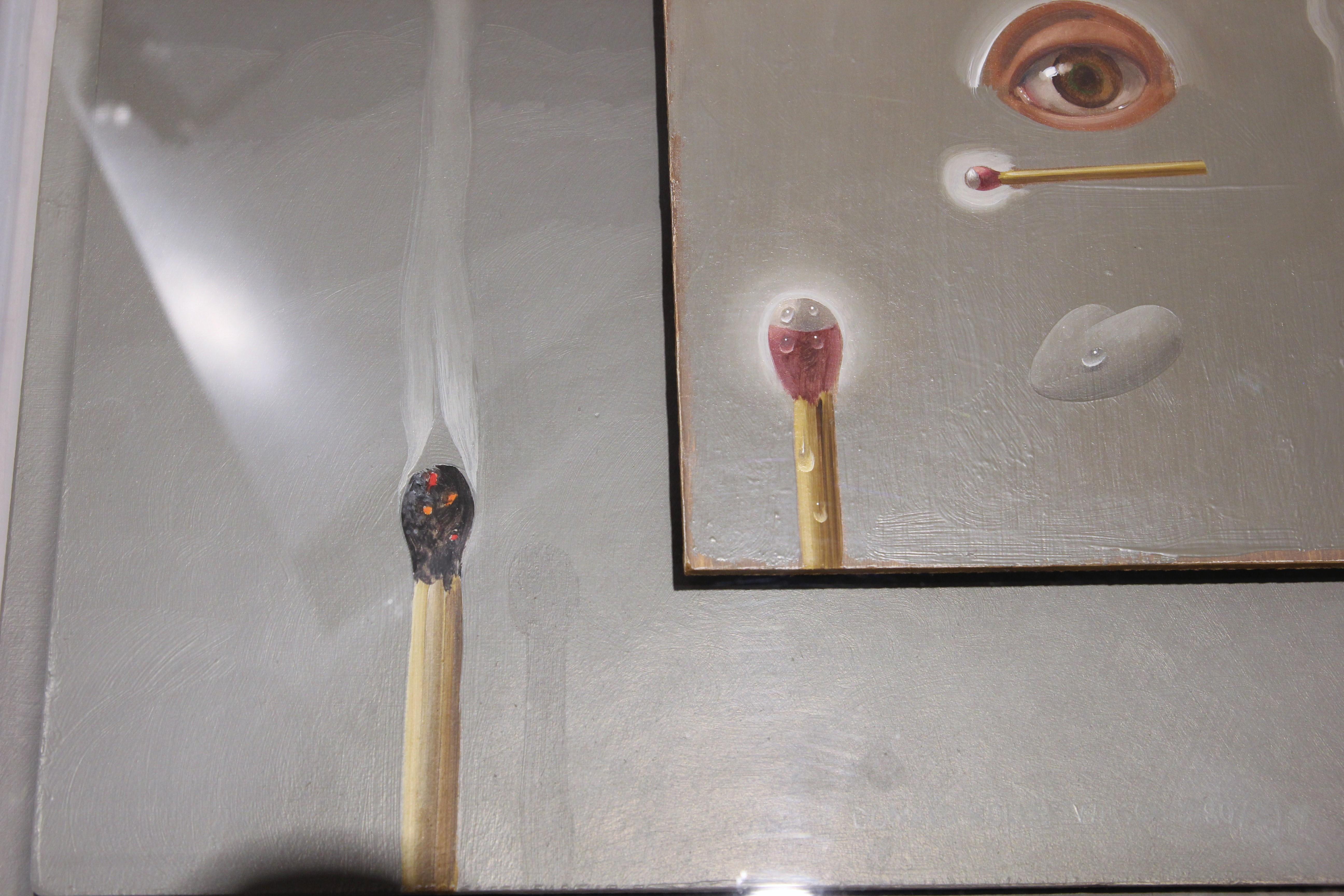 Surrealist still life separated on four different panels and one canvas. The center panel has an eye in the middle with a match and an organic mass. On either is unlit matches. Two panels and a canvas frame the top of the piece. The canvas has an