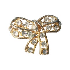 DONALD STANNARD - Gold Tone & Rhinestone Bow Brooch - U.S. - Circa 1980's