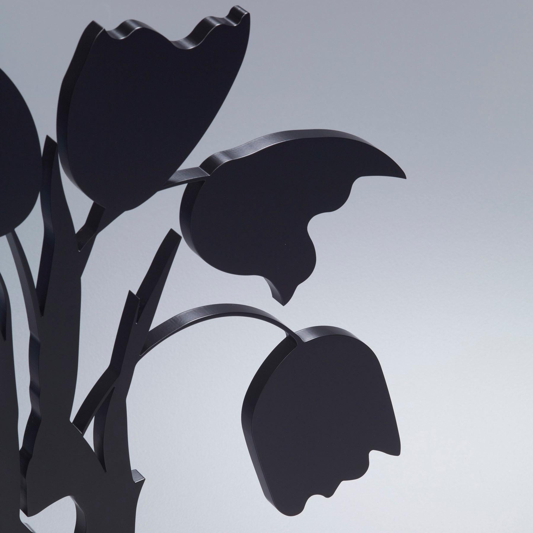 Belonging to the famous Flower series, this sculpture is an abstract reinterpretation of still life tradition.

Donald Sultan, Black Tulips and Vase, April 5
Black Tulips and Vase, April 5 - Contemporary, 21st Century, Sculpture, Black 
Painted