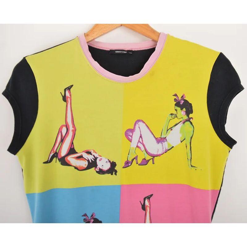 Loud naughties Y2k Donnatella Versace era T shirt from Spring 2004 with photographic pop art print front contrast sleeve and pink ringer style collar.

We also have the matching mini skirt available to purchase separately from our