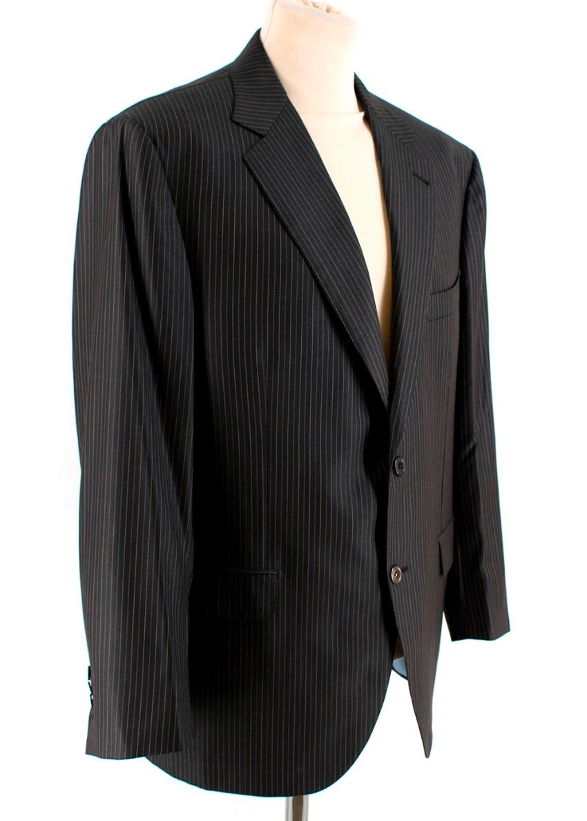Donato Liguori Bespoke Black Pin Striped Tailored Suit

- Bespoke tailored suit 
- Black pinstripe 
- Suit jacket features a single breasted design, notched lapel, buttoned cuffs, front flap pockets and back vents 
- Trousers feature a concealed zip