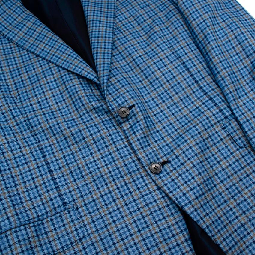 Donato Liguori Blue Checkered Cashmere blend Tailored Single Breasted Blazer Jacket 

-Luxurious soft cashmere texture 
-Beautiful blue checkered pattern 
-Single breasted design 
-Vents to the back 
-3 pockets to the front 
-4 interior pockets