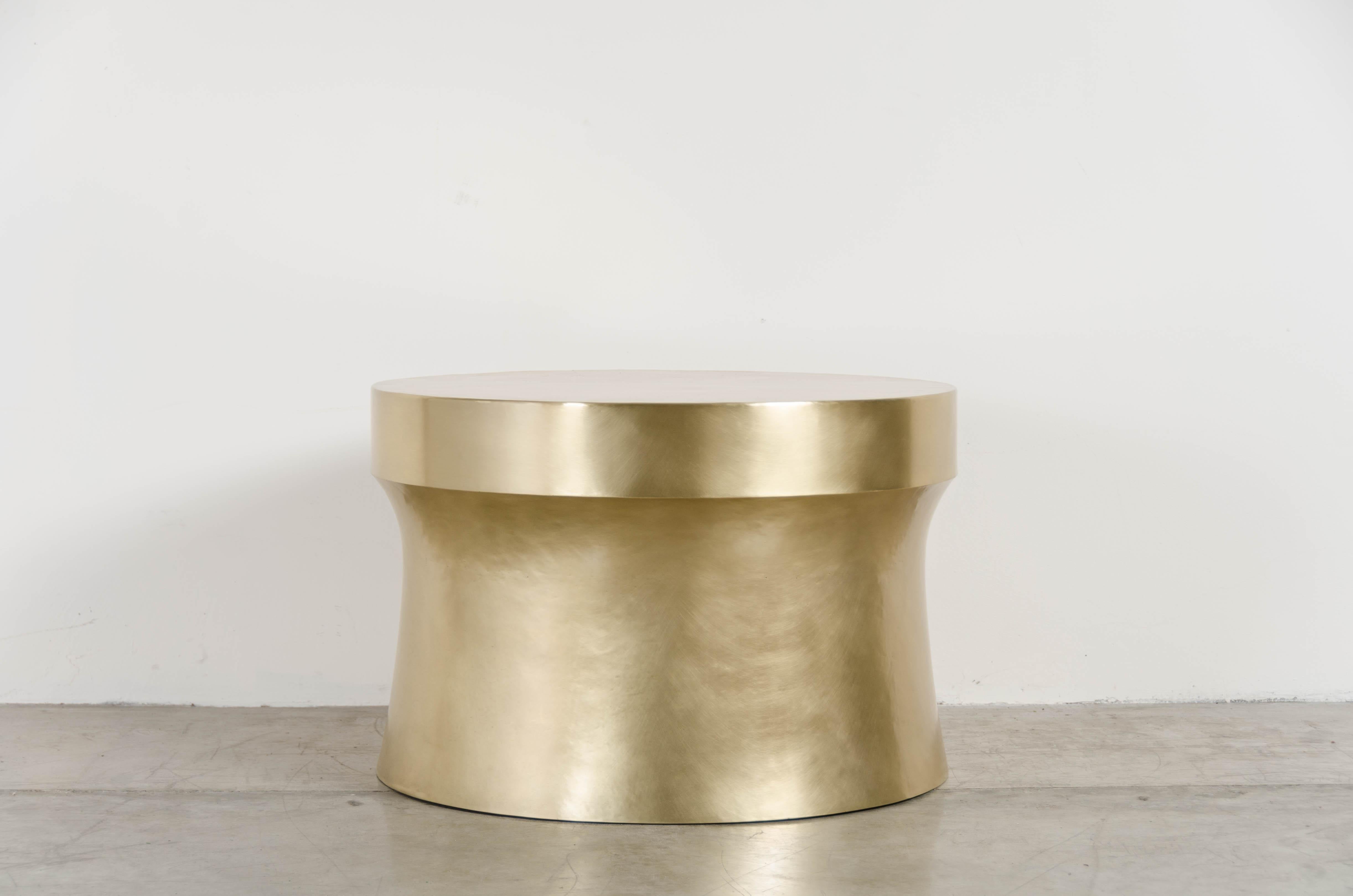 Dong Shan table
Brass
Hand Repousse
Limited edition
Each piece is individually crafted and is unique.

Repousse´ is the traditional art of hand-hammering decorative relief onto sheet metal. The technique originated around 800 BC between Asia