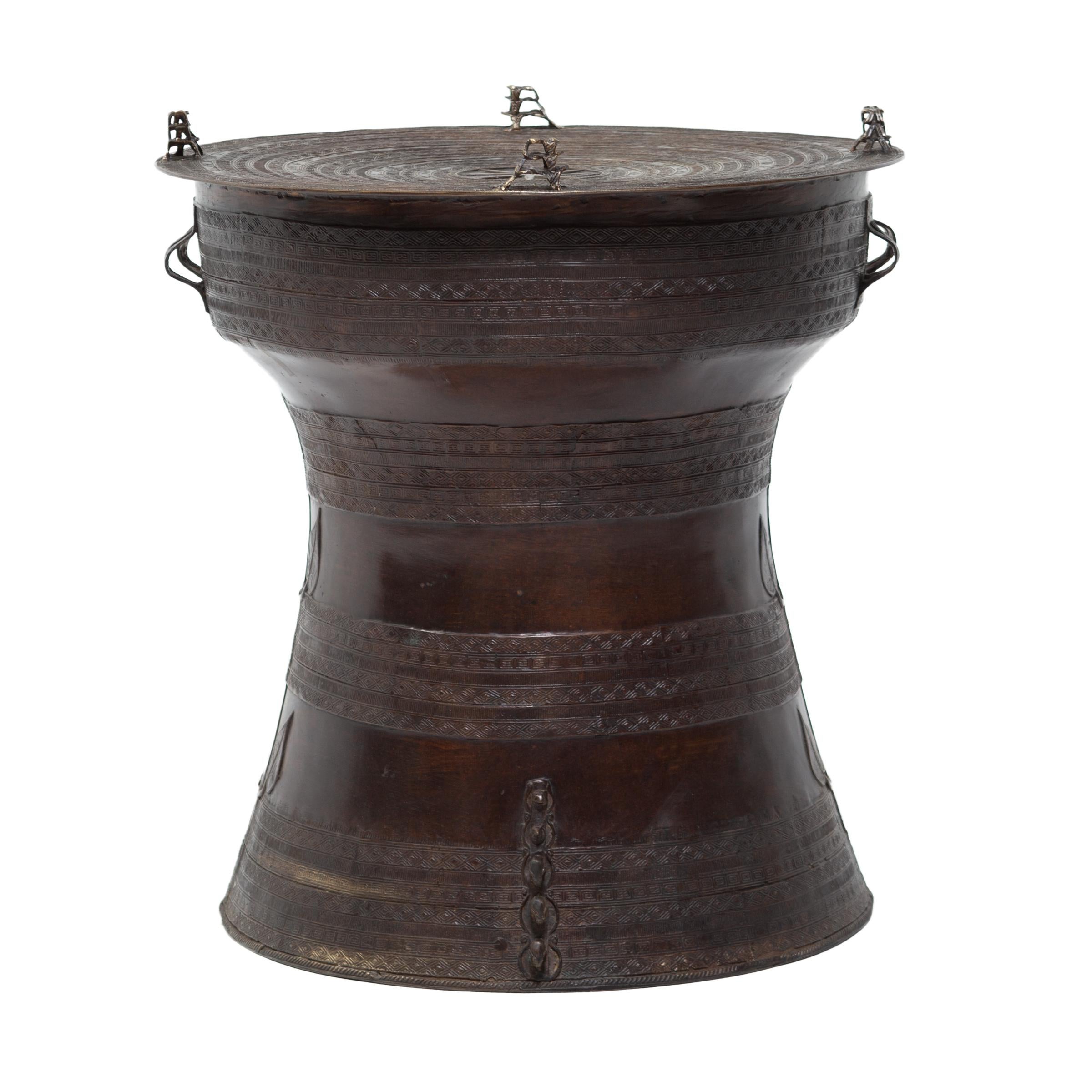 Based on forms created by the Dong Son culture of Vietnam as early as 600 BCE, this cast bronze rain drum continues tradition with beautiful precision. Created by artisans of the Karen culture of Burma and northern Thailand, bronze rain drums were