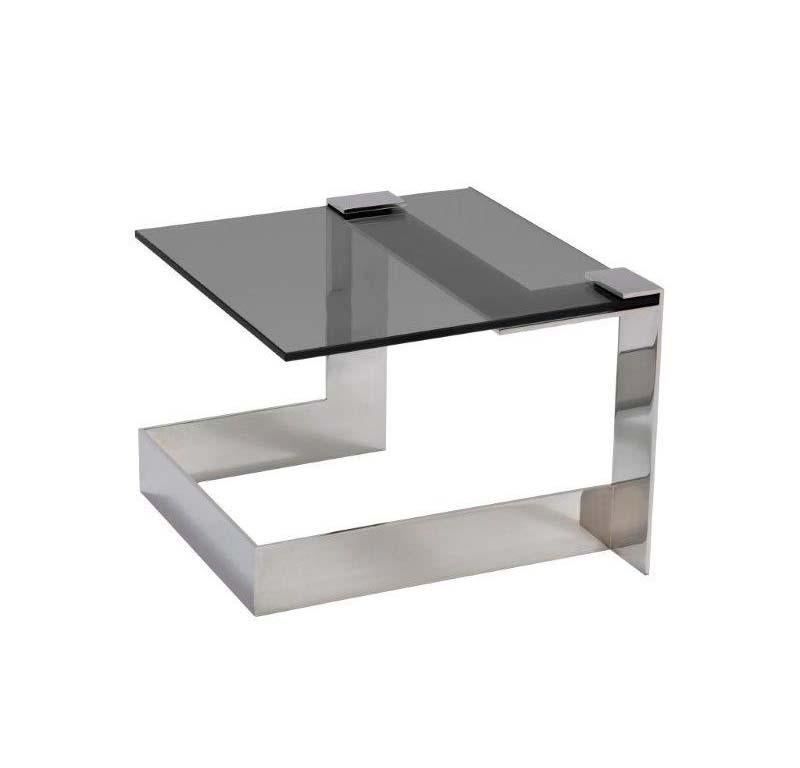 Sculptural with modular components, this table will Anchor any room. The Anchor table is a customizable piece, available with the option to select the number of bases and tops. The chrome stainless steel base and glass top provide a Rubix cube like