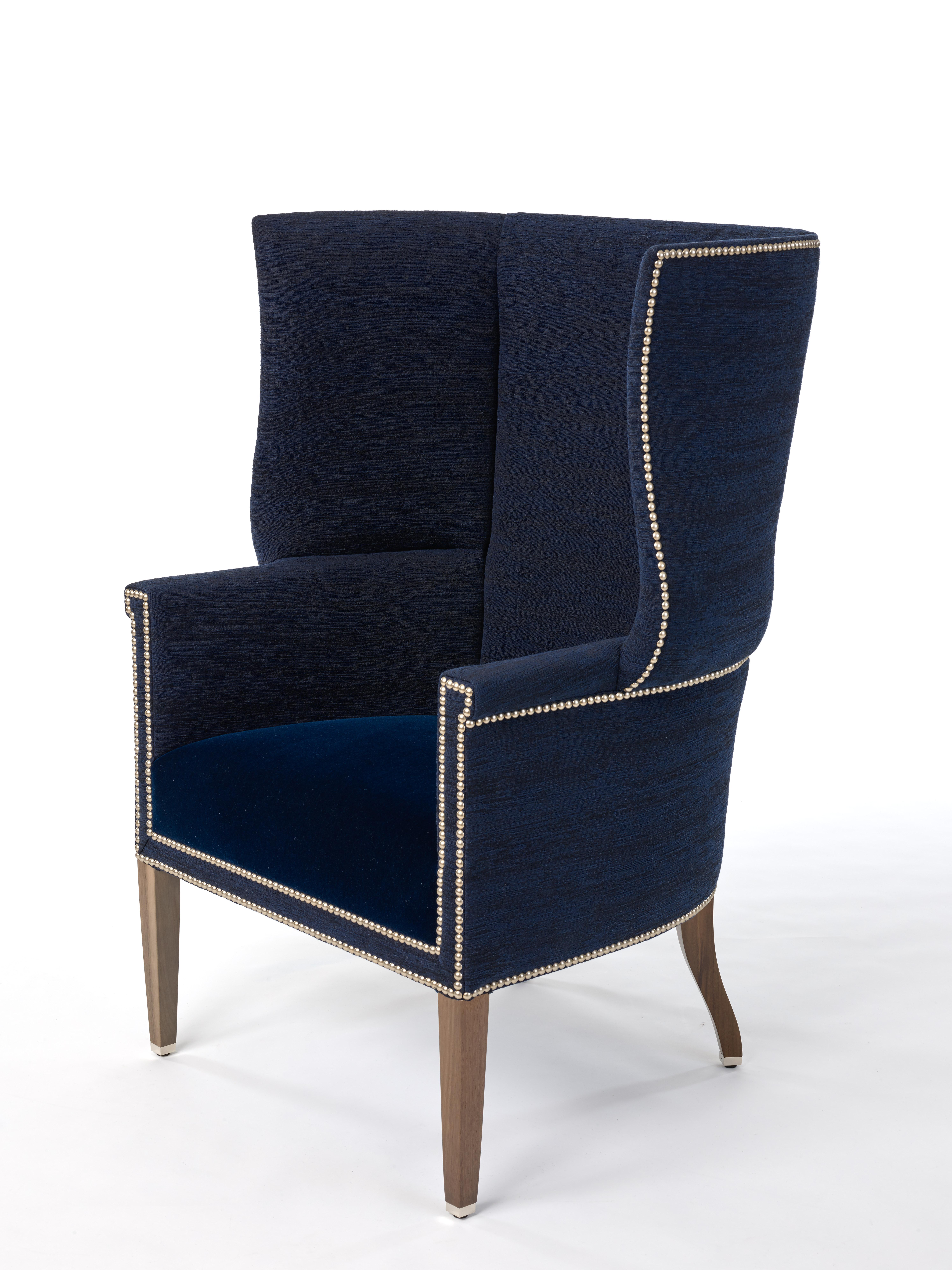 Angelo Donghia custom made this wing chair for a client's residence in the Canyon Country Club in Palm Springs. The Donghia Design Studio has updated the classic piece to exhibit a fresh, modern approach. Enhanced by bold curves, the wings are