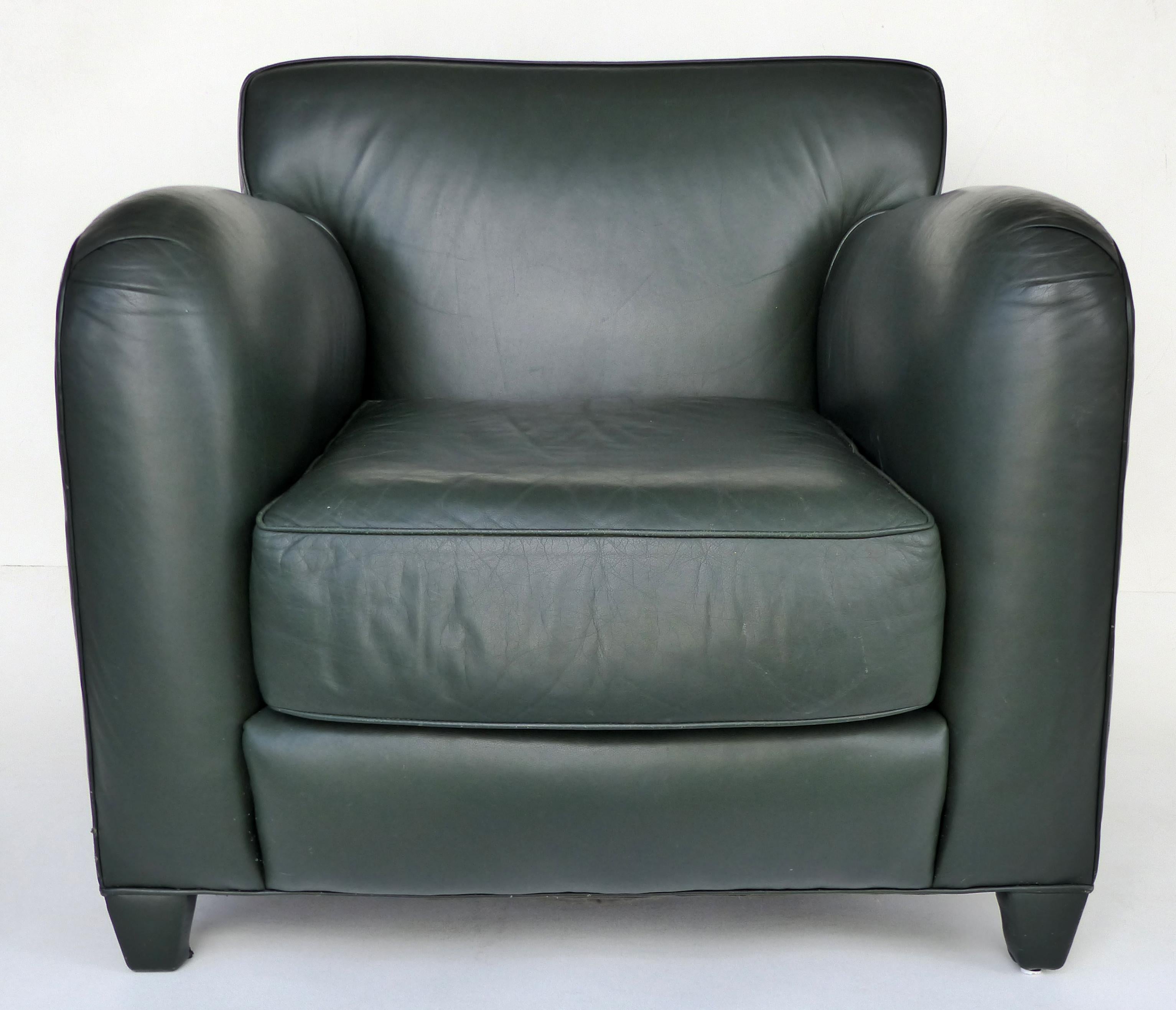 Donghia Leather Club Chairs from the Main Street Collection in Forest Green

 Offered for sale is a pair of Donghia forest green leather club chairs from the Main Street collection. These comfortable club chairs have deep, supple leather seats with