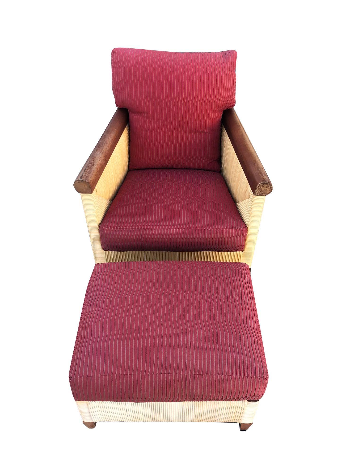 A stunning brown mahogany organic modern rush cane lounge chair with ottoman from the limited production Merbau Collection designed by John Hutton (1947-2006) for Donghia in 1995. Examples from this particular series are nearly impossible to find