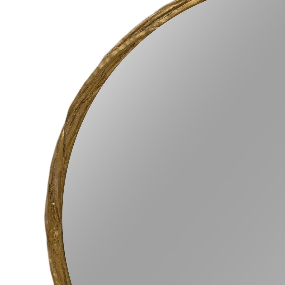 A Porta Romana Laurel round wall mirror in French brass finish by Donghia, circa 2010.

Dimensions: 43 inches W