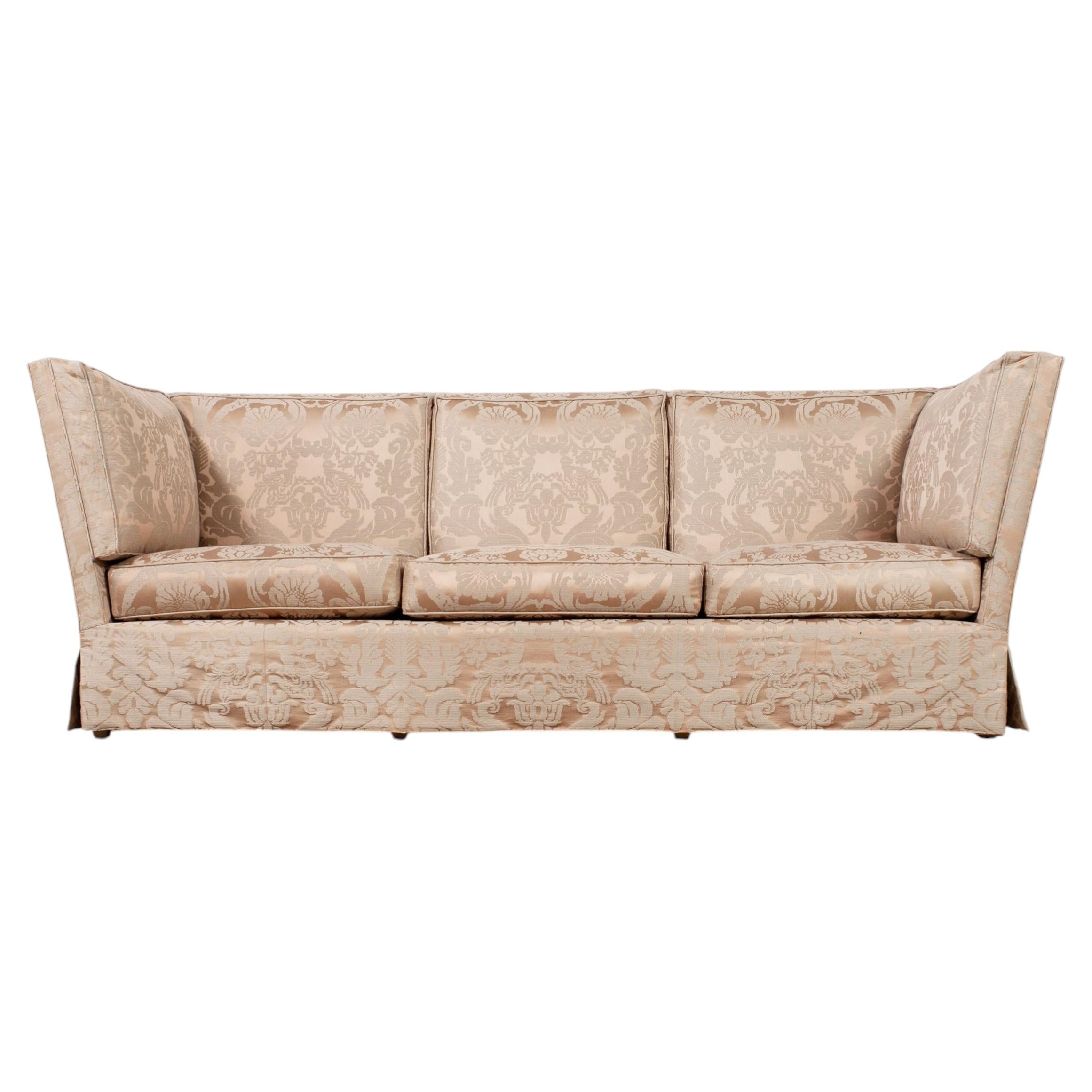 What is a Knole drop-arm sofa?
