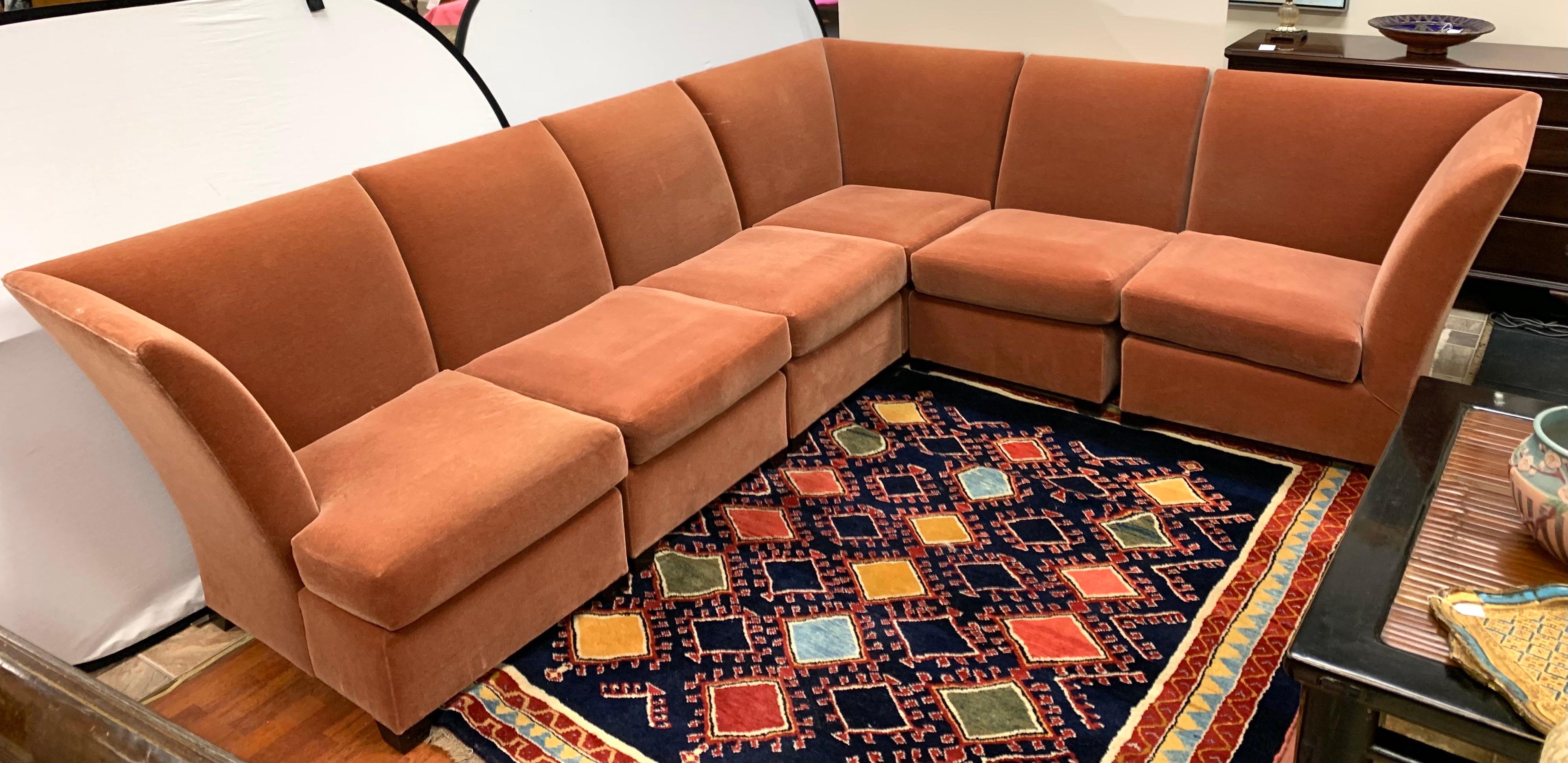 Magnificent Donghia six piece sectional L-shaped modular sofa. The fabric is the coveted Donghia salmon rose mohair and is very luxurious. The sectional is about sever years old and fabric is original and still in good shape but does have some age