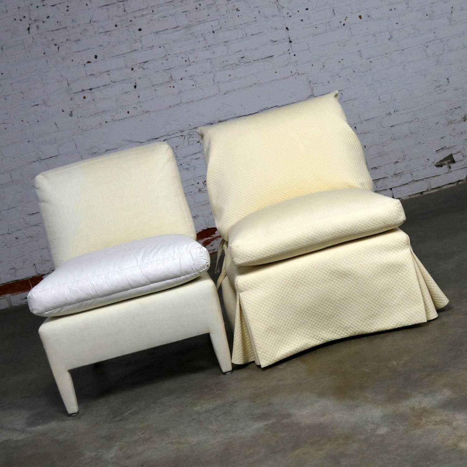 Beautiful slipper chair for Donghia Inc. designed by Angelo Donghia. One is slipcovered in a gorgeous quilted off-white fabric and in wonderful vintage condition apart from the fabric of the slipcover seems to have yellowed slightly. The second is
