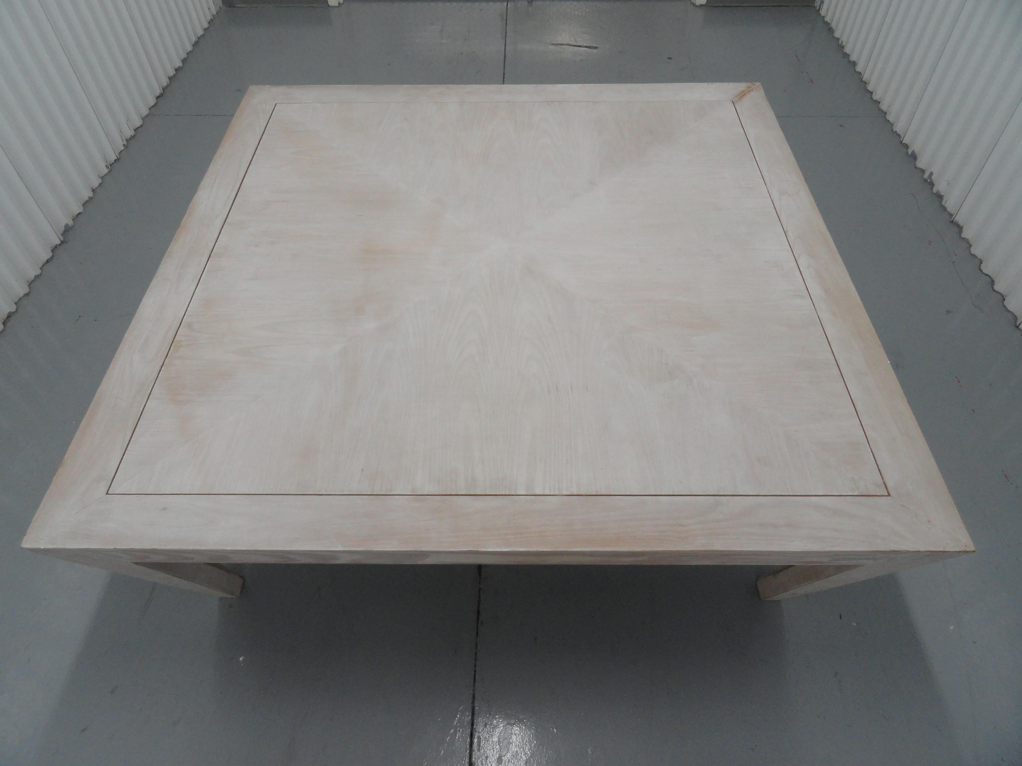 Custom designed, custom sized cocktail table based on the Classic Donghia Paris wooden cocktail table. Off-white hand-rubbed finish.
Matched ashwood on top pattern.