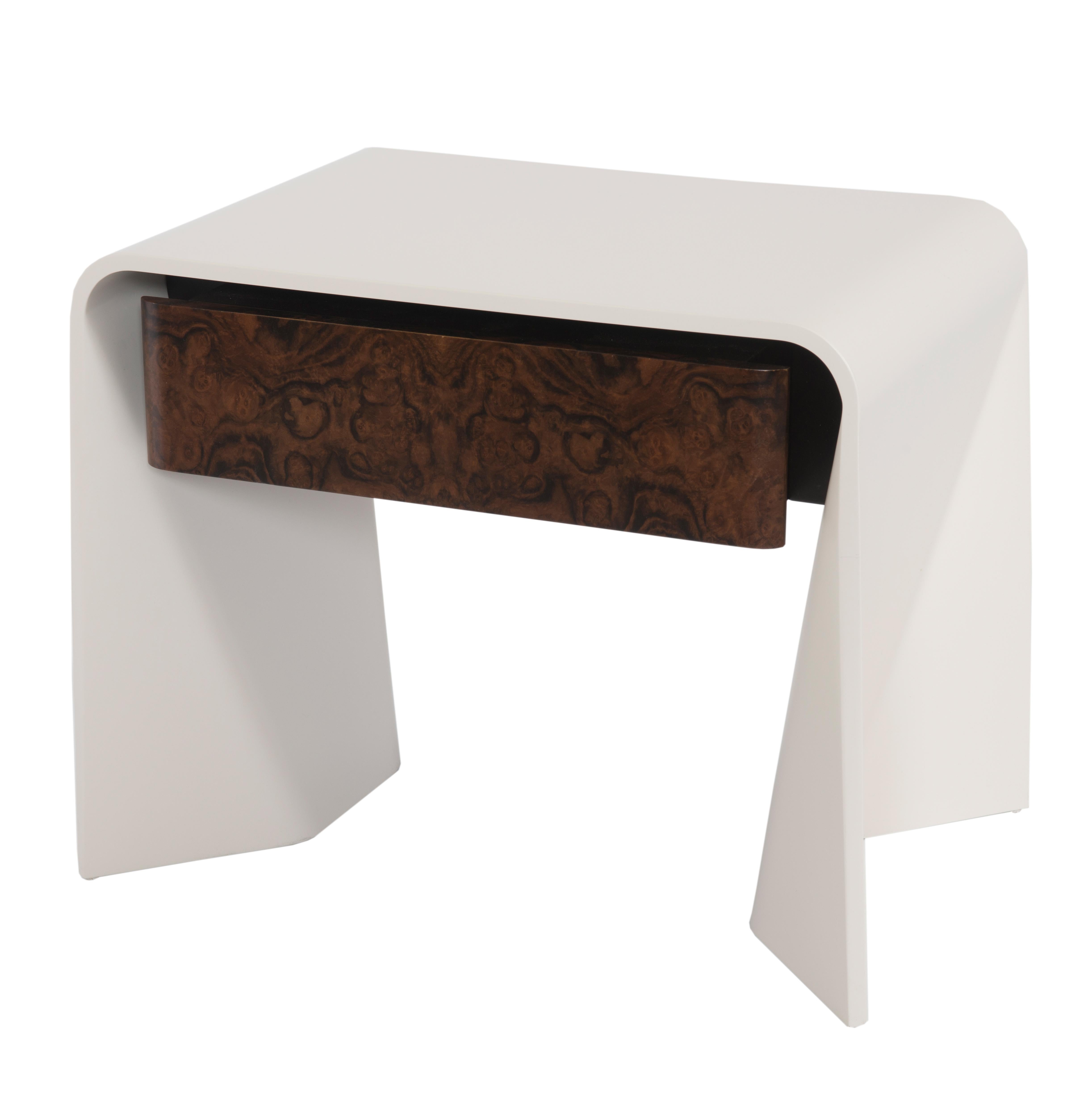 Rectangular bentwood end table featuring one drawer in a burled walnut veneer and a parchment color satin lacquer body. Made by bending thin pieces of wood, tendu is a ballet term meaning 
