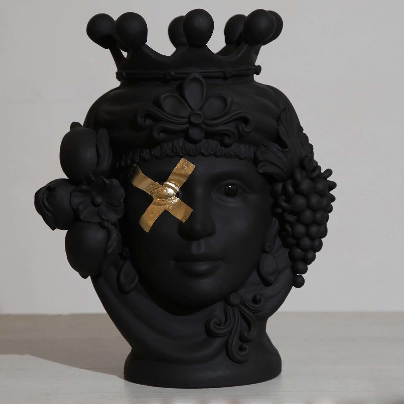 Skillfully handmade by sculptor Stefania Boemi, this anthropomorphic vase of a woman is a striking homage to Sicily's rich cultural traditions. The subject is drawn from Sicilian lore, a story of love and revenge between a Moor and a maiden dating