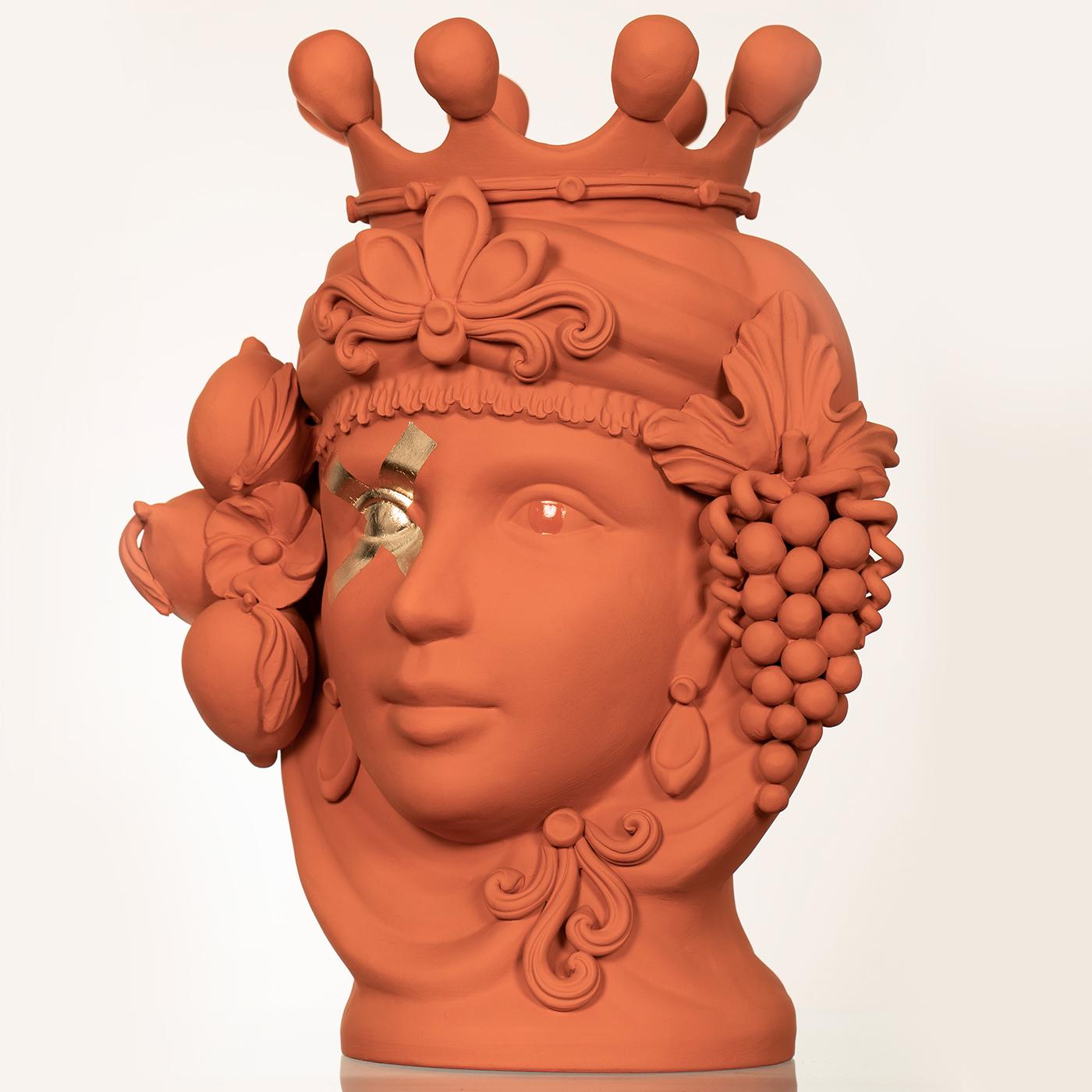 This unique work of art is sure to make a statement in an eclectic or modern decor, where it will be an ideal vessel to display floral compositions or as a statement sculpture. Its design is inspired by the Moorish-inspired sculptures in Sicilian