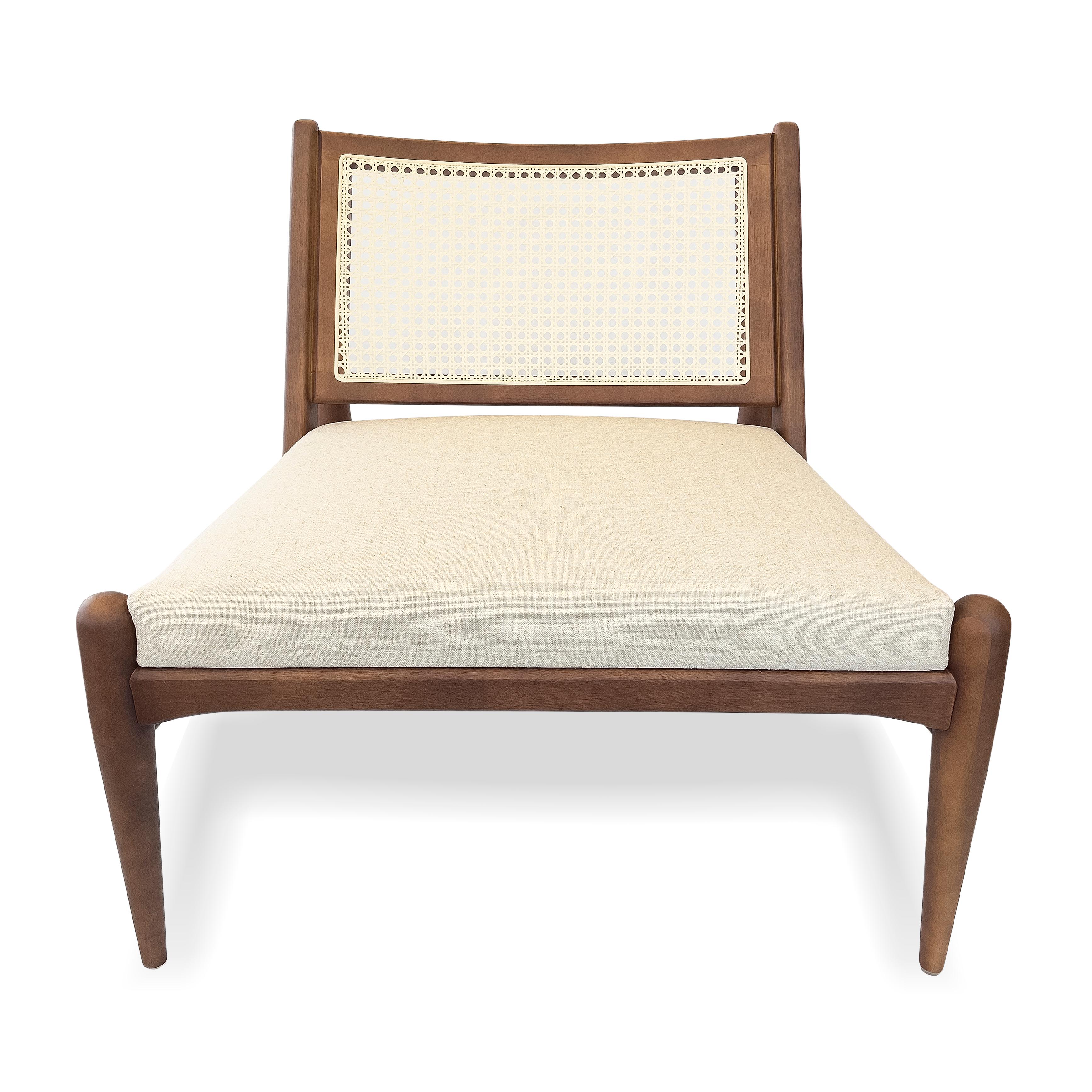 A Donna cane-back chair by Uultis with walnut finish and Oatmeal fabric. *Please check availability prior to purchase*.

Introducing the Donna cane-back chair, beautifully designed with a walnut wood finish, an oatmeal fabric seat, and a natural