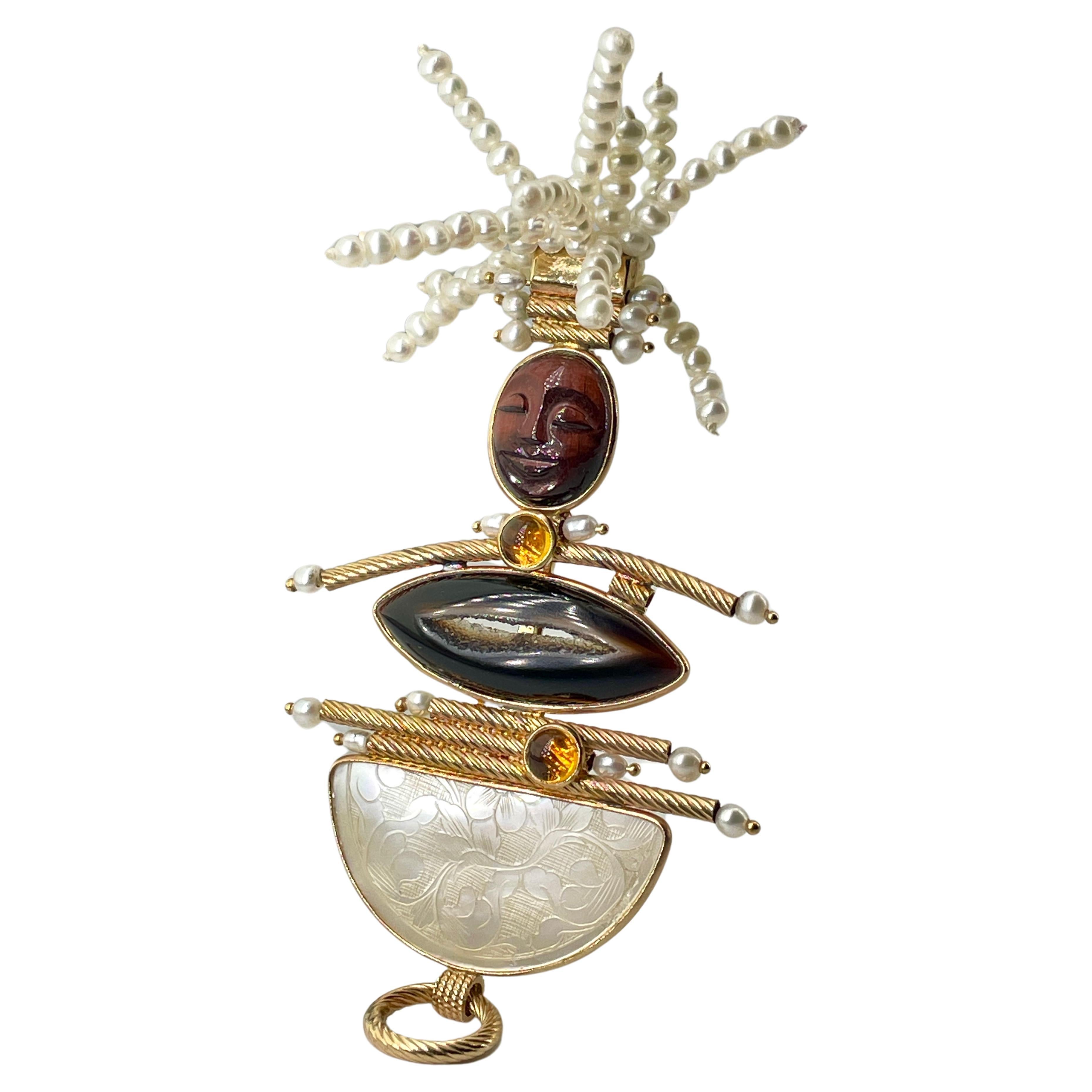Contemporary Pin/Pendant. 14K Gold & Antique Mother-of-Pearl, Chinese Gambling Chip Pin, and Combination Enhancer. Hand-carved tiger-eye face, headdress of Citrine diamond-cut beads. She's also adorned with Citrine cabochon and Geode Quartz Agate.