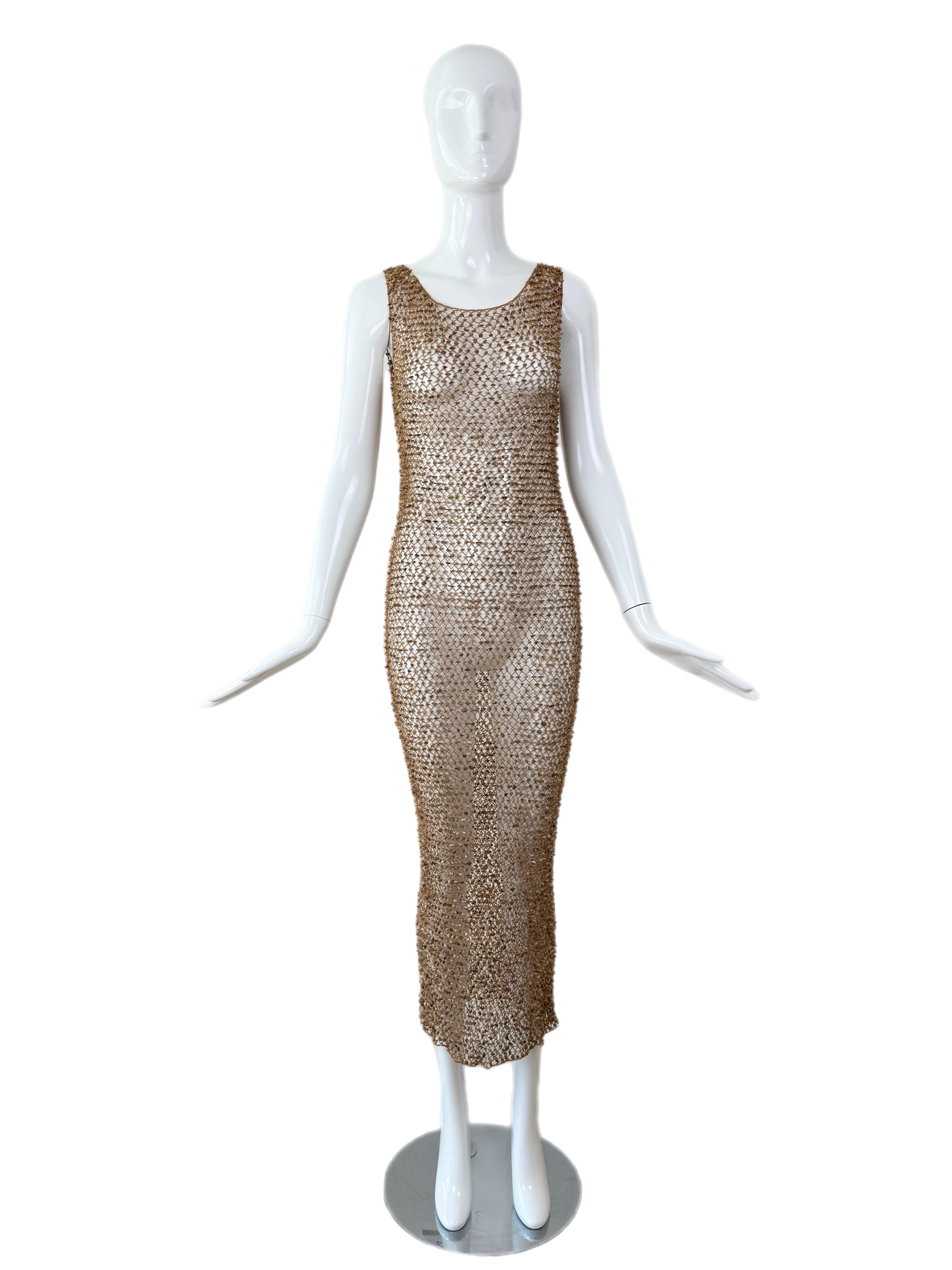 Donna Karan
Vintage
Runway
SS97
Warm neutral tones
Sheer cotton net with actual rocks
Heavy! 3.5 pounds
Pullover
Size Small
Pristine
Measurements in inches laying flat: length 55, pit to pit 13 to 15, waist 11 to 13

FINAL SALE