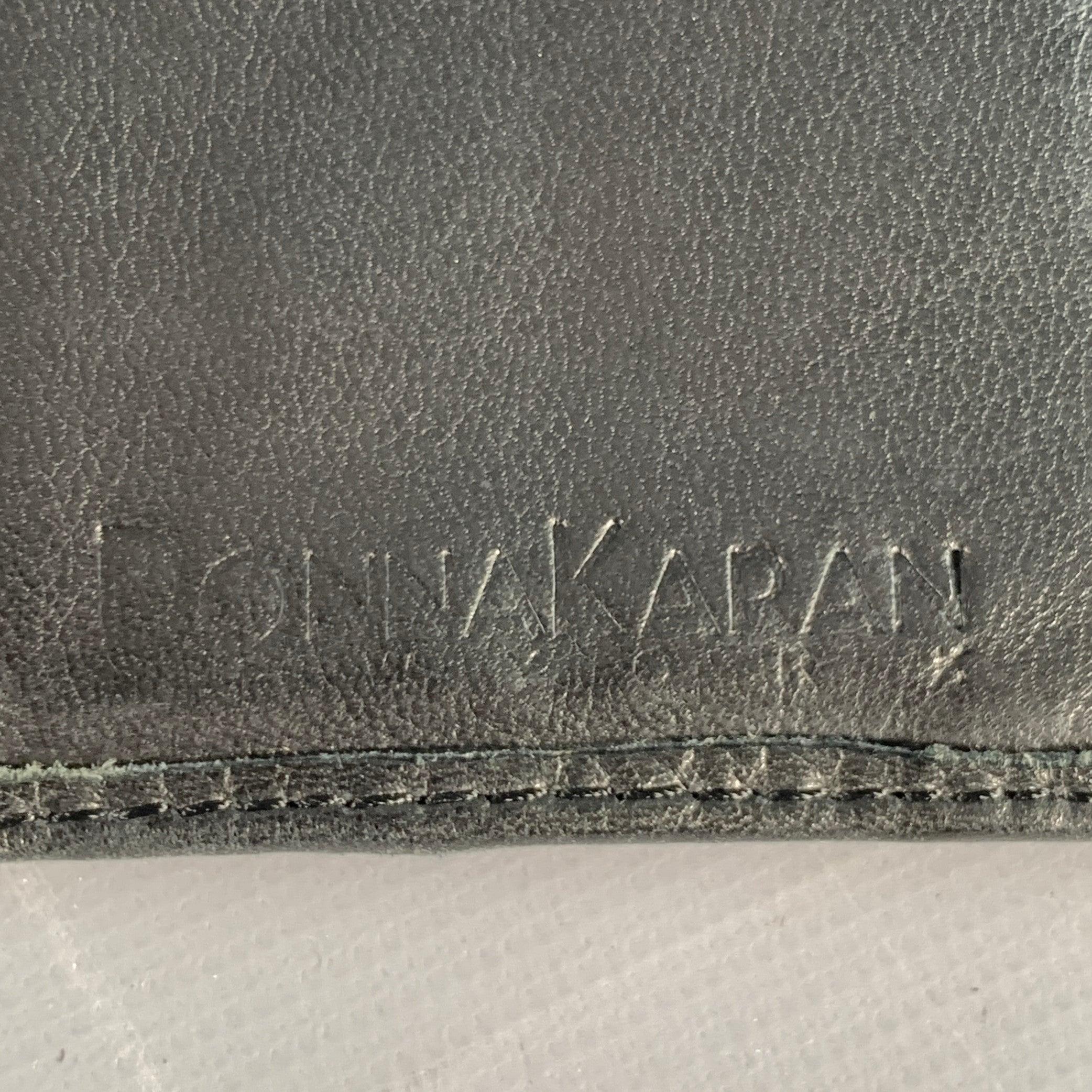 Noir DONNA KARAN Portefeuille en cuir noir et or en vente