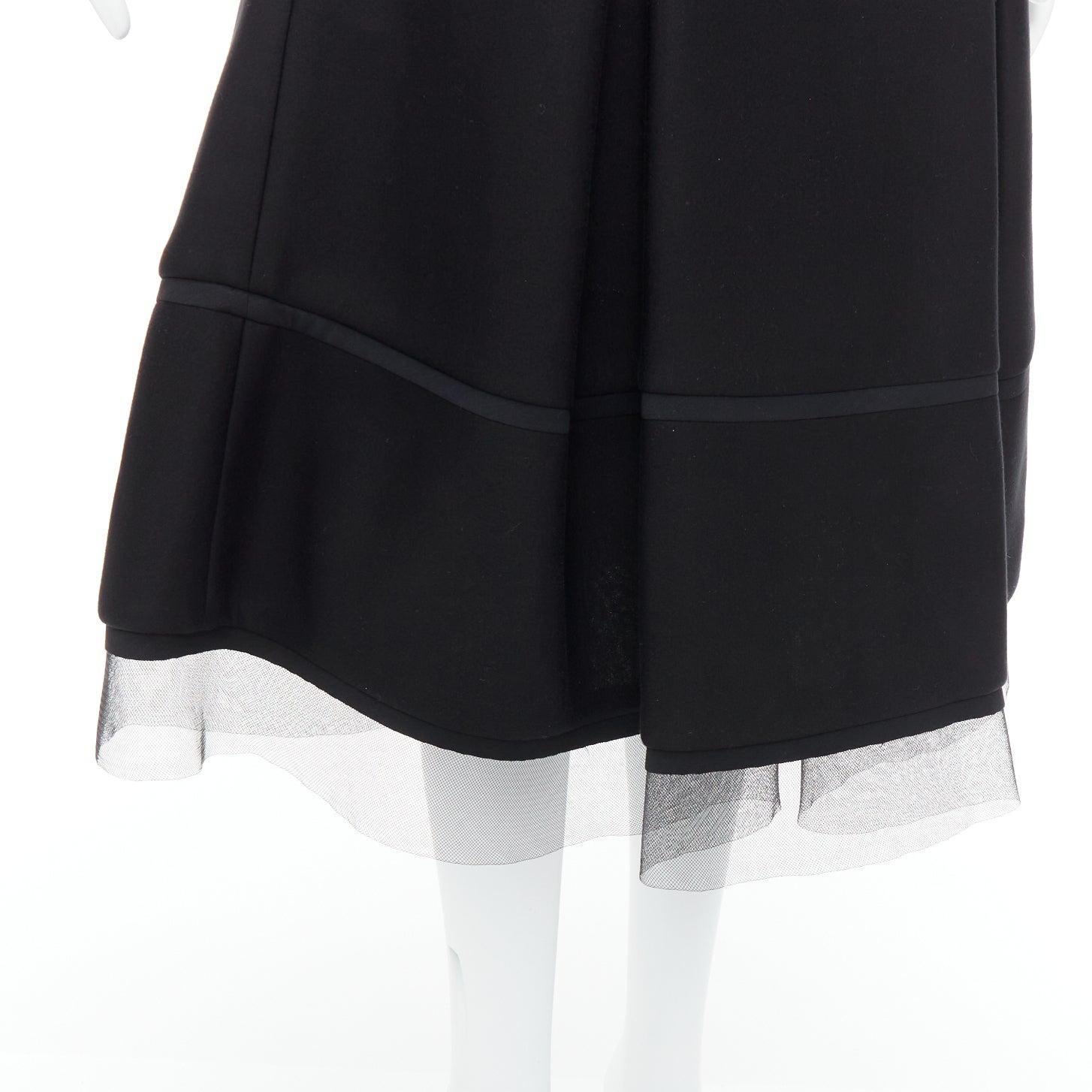 DONNA KARAN gonna a ruota in scuba nera, plissettata e con rifiniture in tulle a rete FR40 L.
Riferimento: JHDN/A00061
Marchio: Donna Karan
Materiale: Modal
Colore: nero
Modello: Tinta unita
Chiusura: zip
Fodera: Tessuto nero
Dettagli extra: Gonna