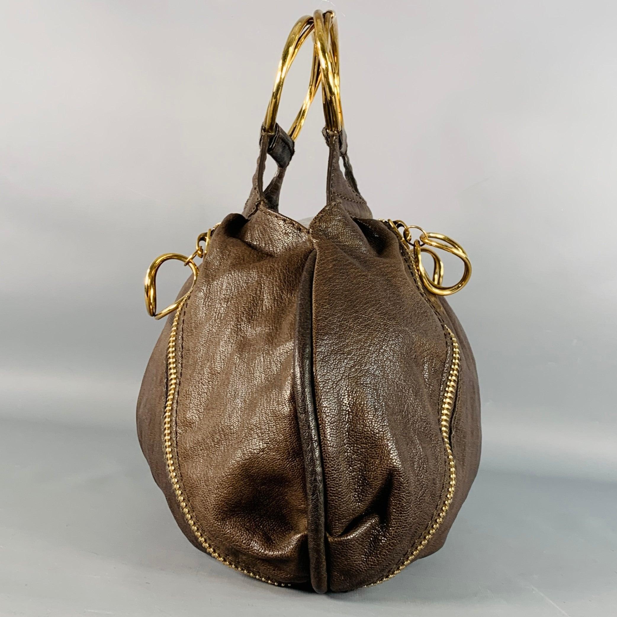 Marrone DONNA KARAN Borsa in pelle di capra marrone oro con cerniere a scomparsa in vendita