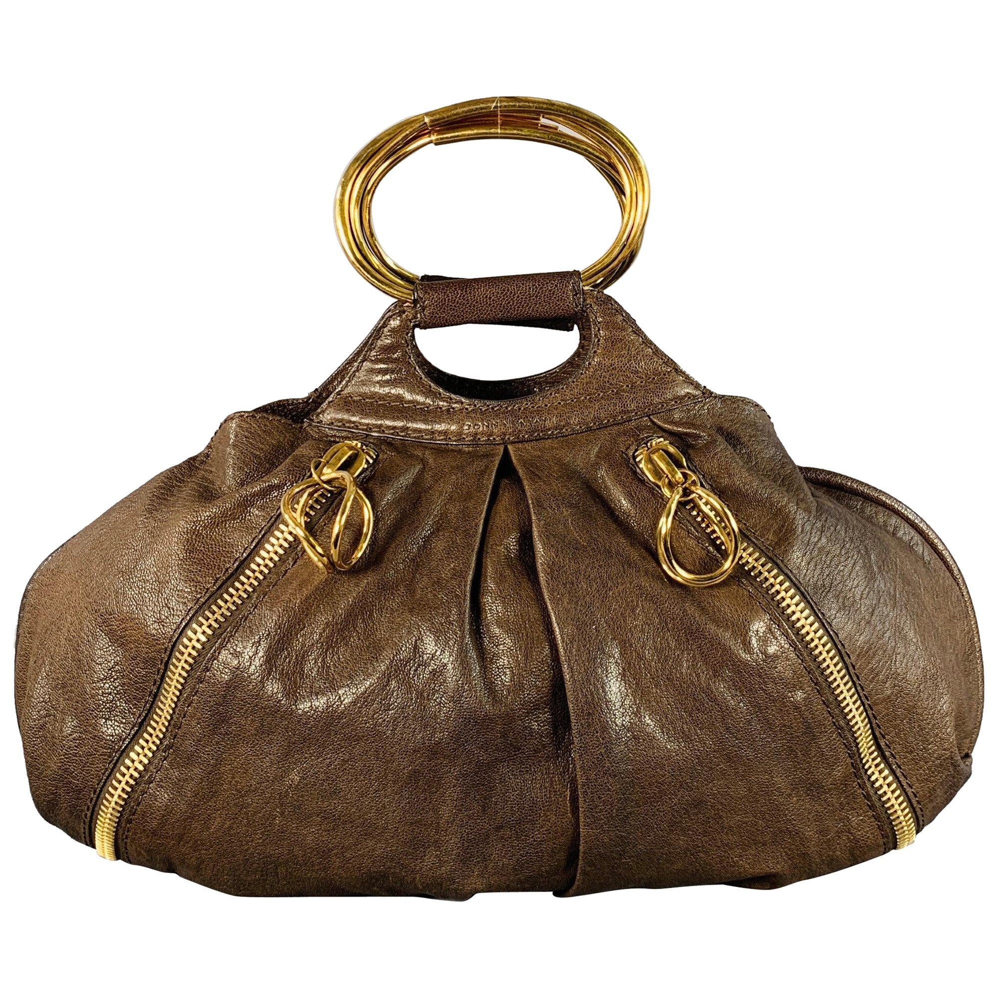 DONNA KARAN Borsa in pelle di capra marrone oro con cerniere a scomparsa in vendita