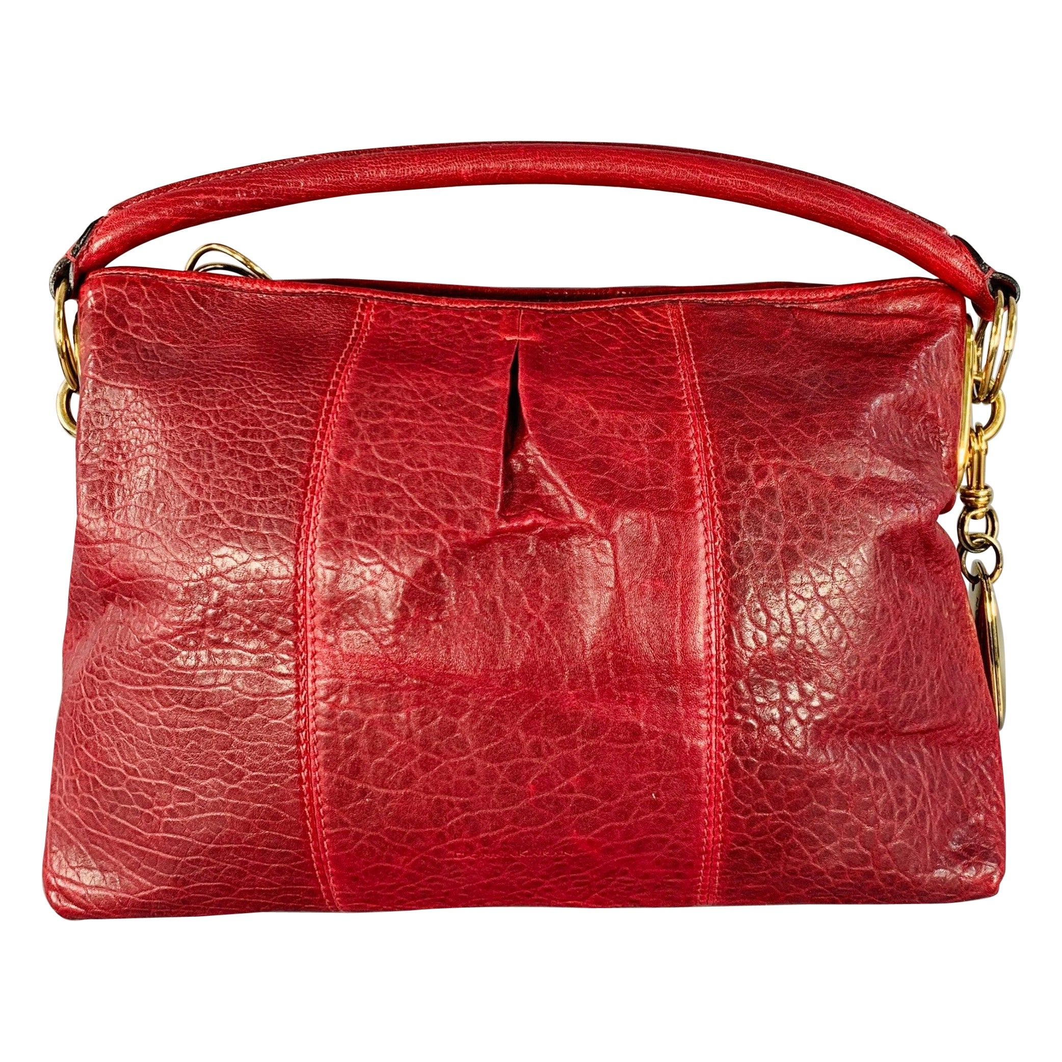 DONNA KARAN Burgunderfarbenes Goldleder Umhängetasche