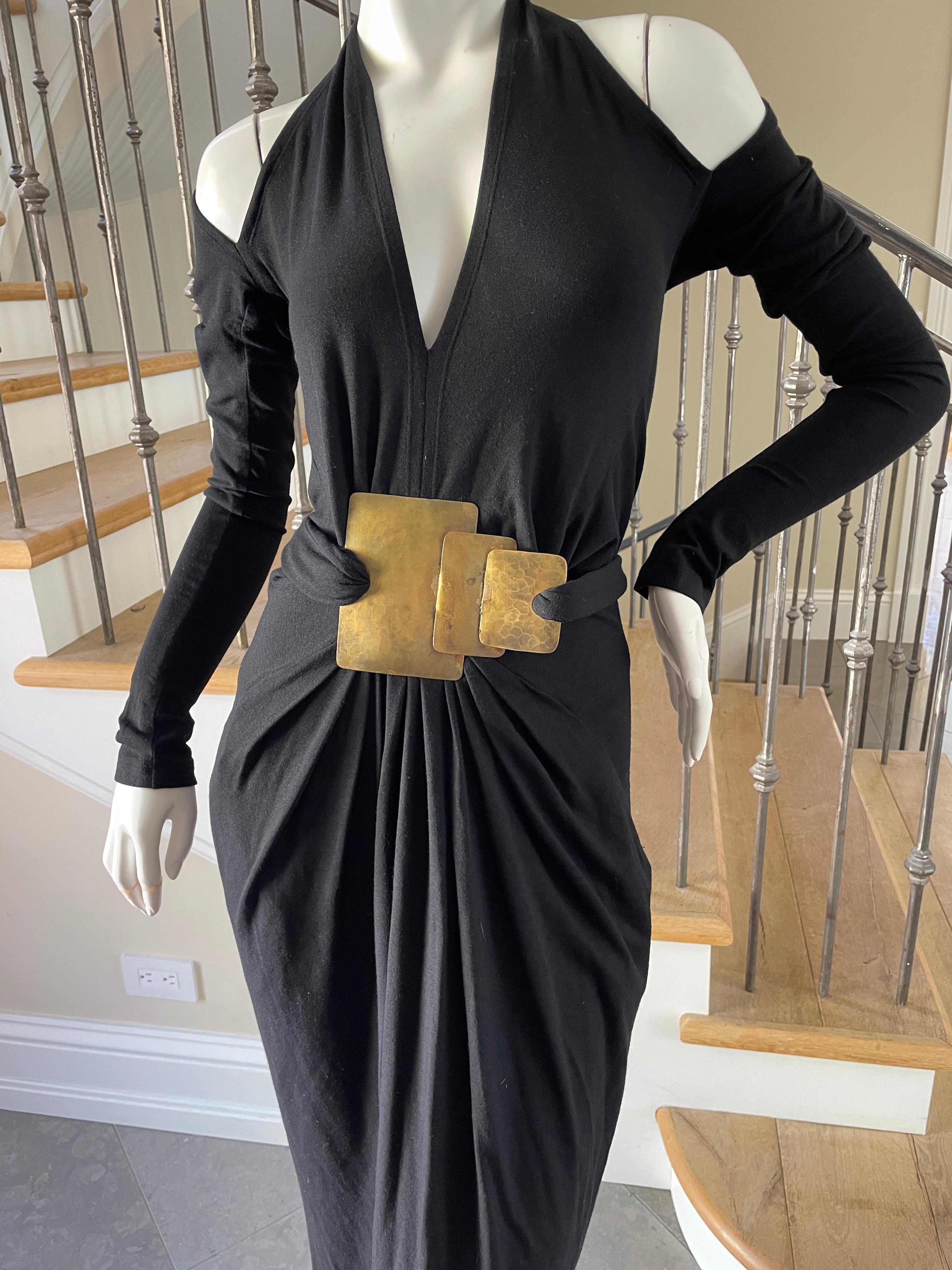 Donna Karan cold Shoulder Evening Dress with Robert Lee Morris Belt Ornament.
This was one of Donna's favorite dress of the collection, see photo of her wearing it with Robert Lee Morris.
Size S. There is a lot of stretch
Bust 34