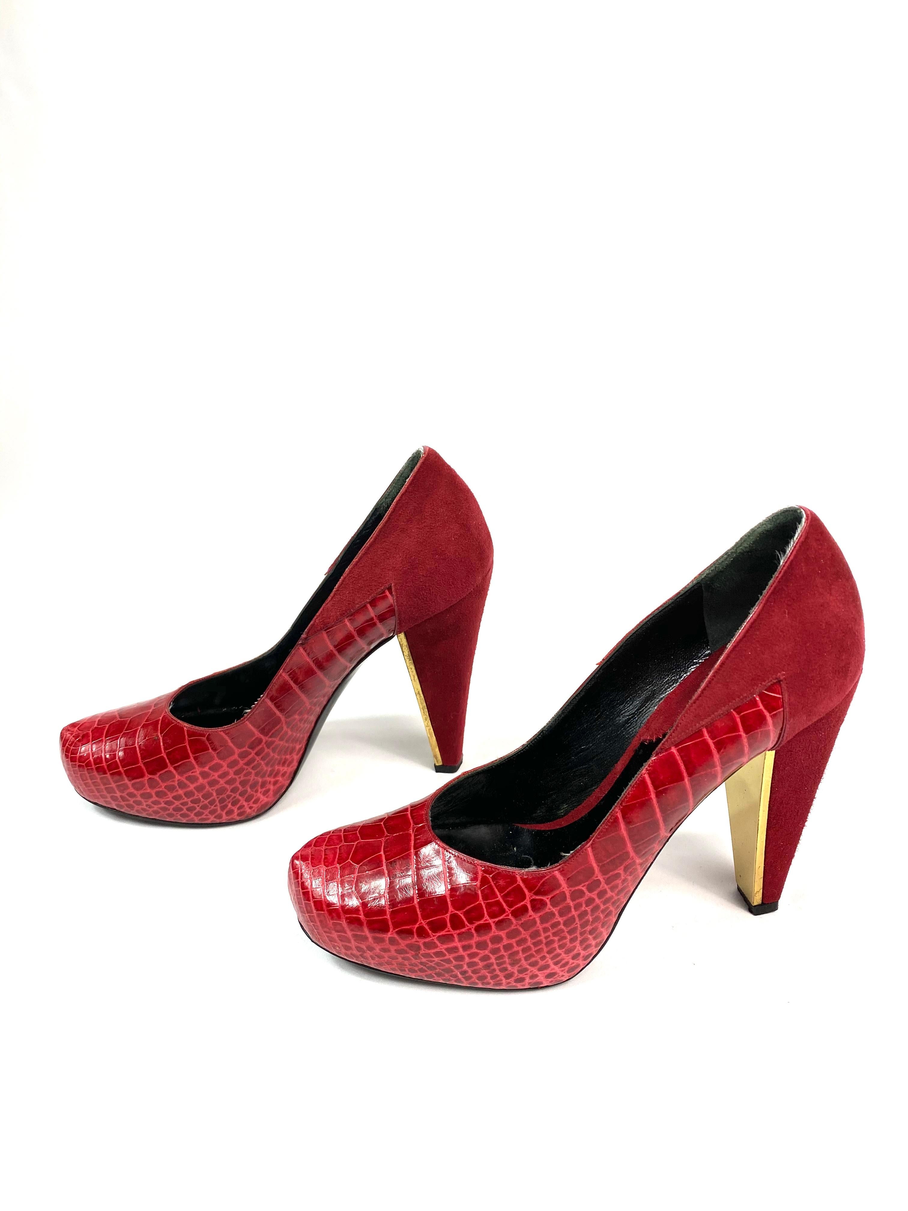 Donna Karan Collections Red Crocodile and Suede Pump Heels Shies Size 38

Product details:
Comes with the original box
Size 38/ 8
Red animal/ crocodile pattern leather and red suede
Gold Plated hardware detail inside the heels
Rounded toe
Heel size