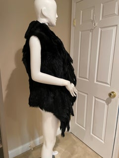 DONNA KARAN faux fur black vest with fringe one size