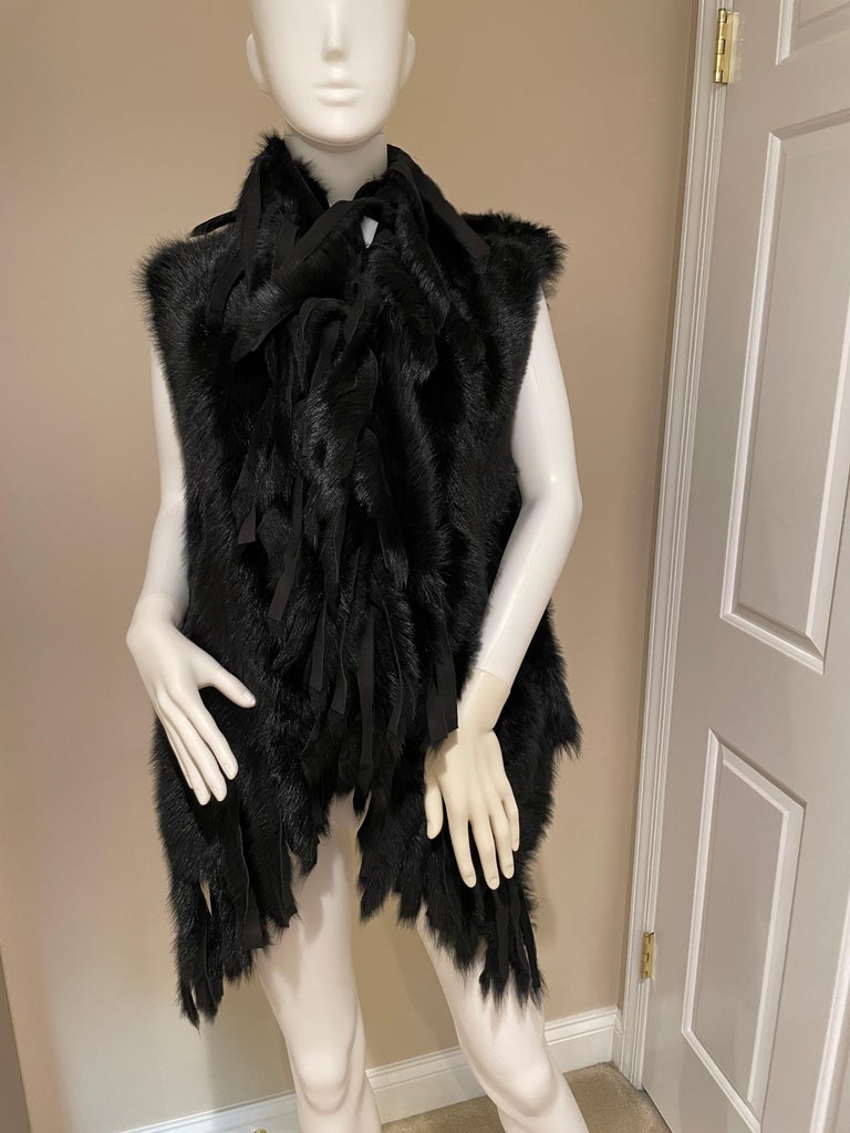 DONNA KARAN faux fur black vest with fringe one size For Sale at 1stDibs