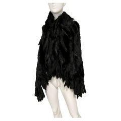 DONNA KARAN faux fur black vest with fringe one size 