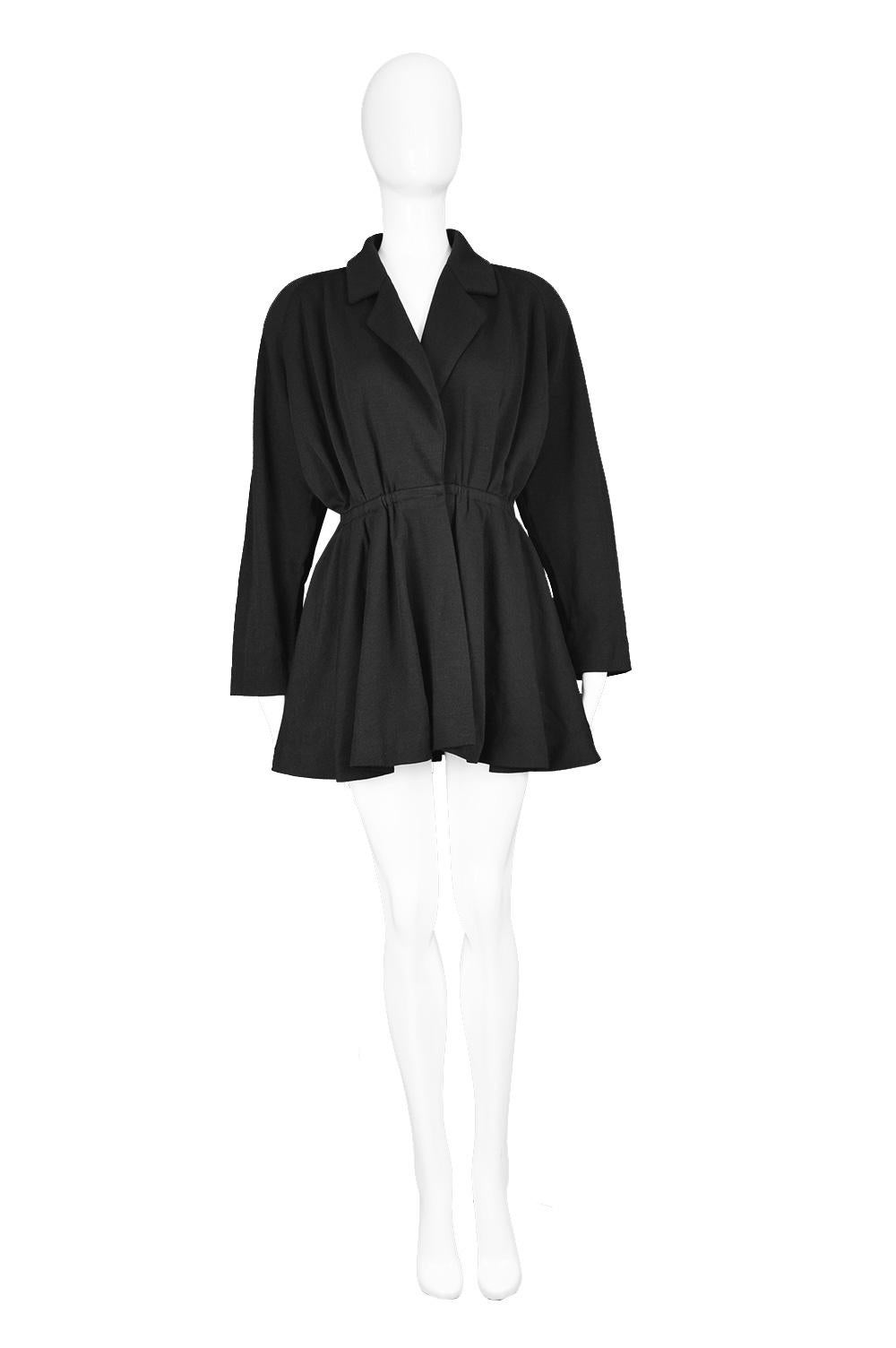 Donna Karan for Bergdorf Vintage Black Wool Structured Shoulder Jacket, 1980s

Click 'CONTINUE READING' below to see size & description. 

An incredible vintage women's jacket from the 80s by luxury American fashion designer, Donna Karan. Originally