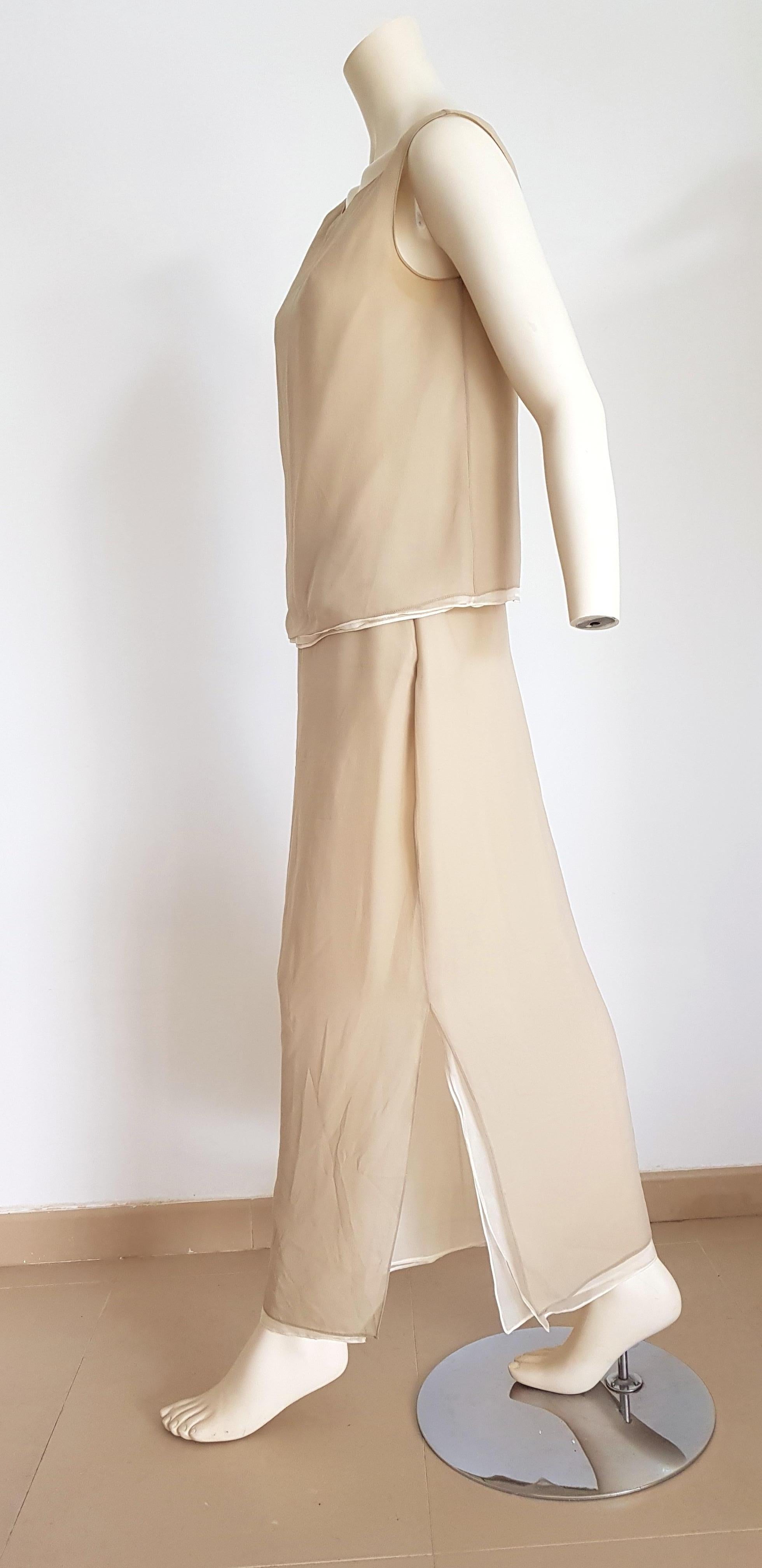 Donna Karan two beige tones, double layer, top and skirt silk dress - Unworn, New

SIZE: equivalent to about Small / Medium, please review approx measurements as follows in cm. 
TOP: lenght 52, chest underarm to underarm 50, bust circumference 85,