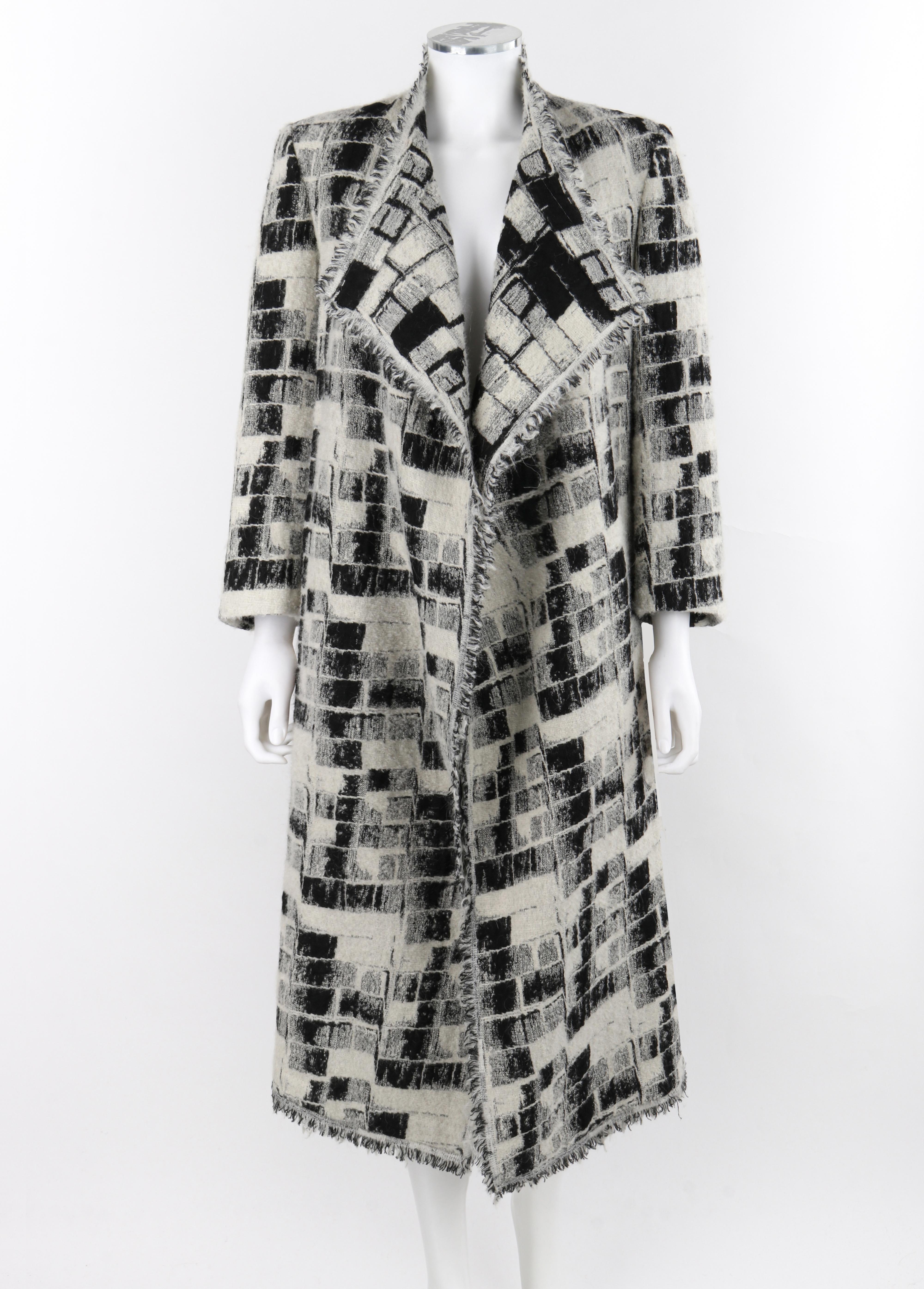 DONNA KARAN Pre-Fall 2015 Black White Checker Knit Open Cardigan Jacket

Brand / Manufacturer: Donna Karan 
Collection: Pre-Fall 2015
Designer: Donna Karan
Style: Cardigan Jacket
Color(s): Shades of white, black, grey
Lined: No
Marked Fabric: 